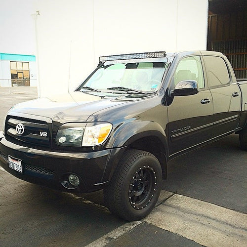 GGLighting curved LED light bar roof mounts installed on a 2000-2006 Toyota Tundra Double Cab.