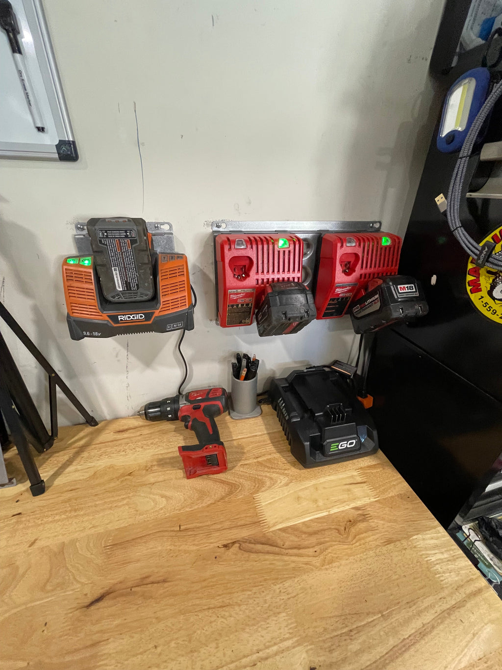 Elevate Metalcraft double wall mount charger plate for Milwaukee, DeWalt, and Ridged tools, ideal for van, truck, or contractor shop use.