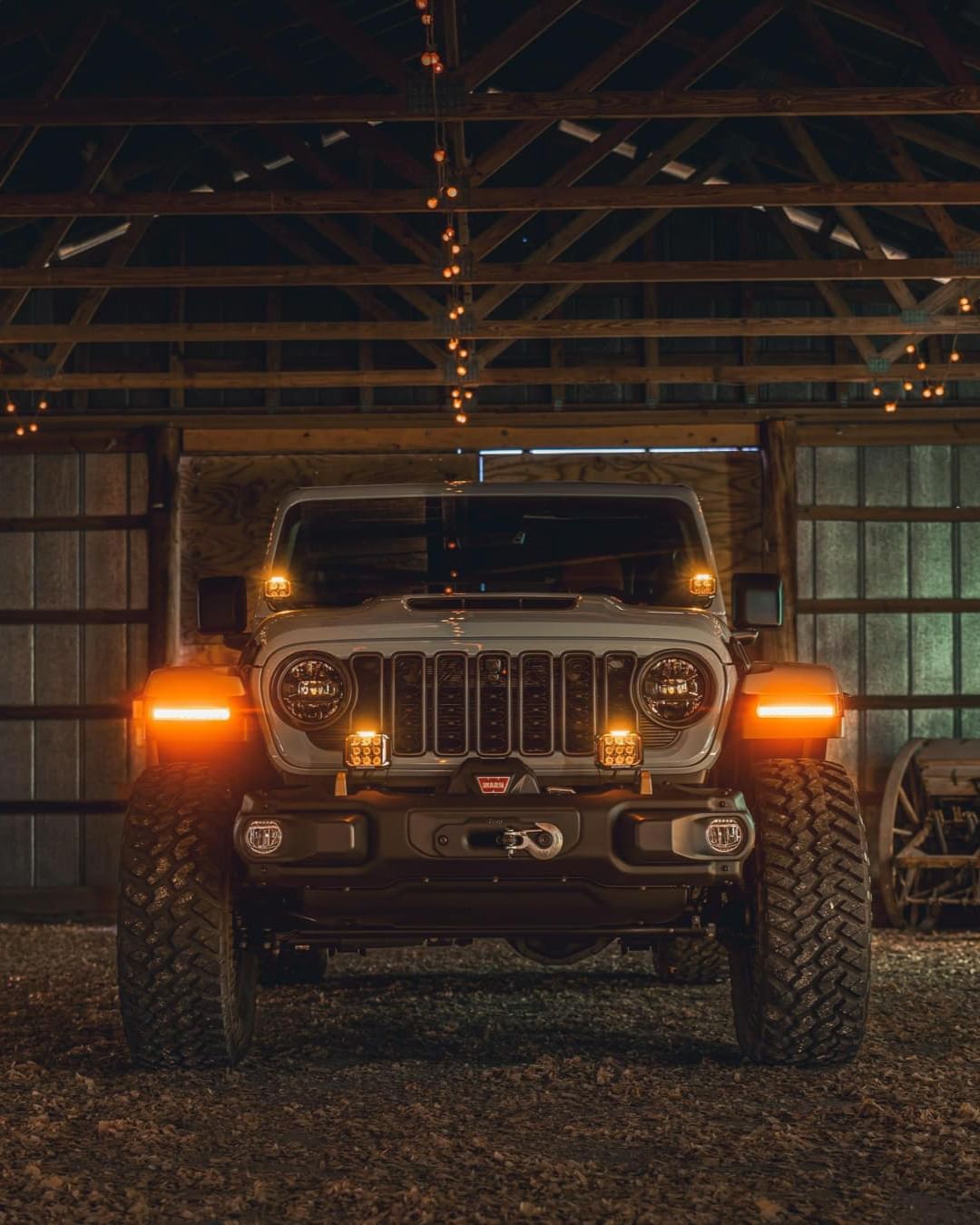 Amber CB30 LED Pod by GGLighting, compact automotive lighting pod with amber LED lights, shown in close-up view.