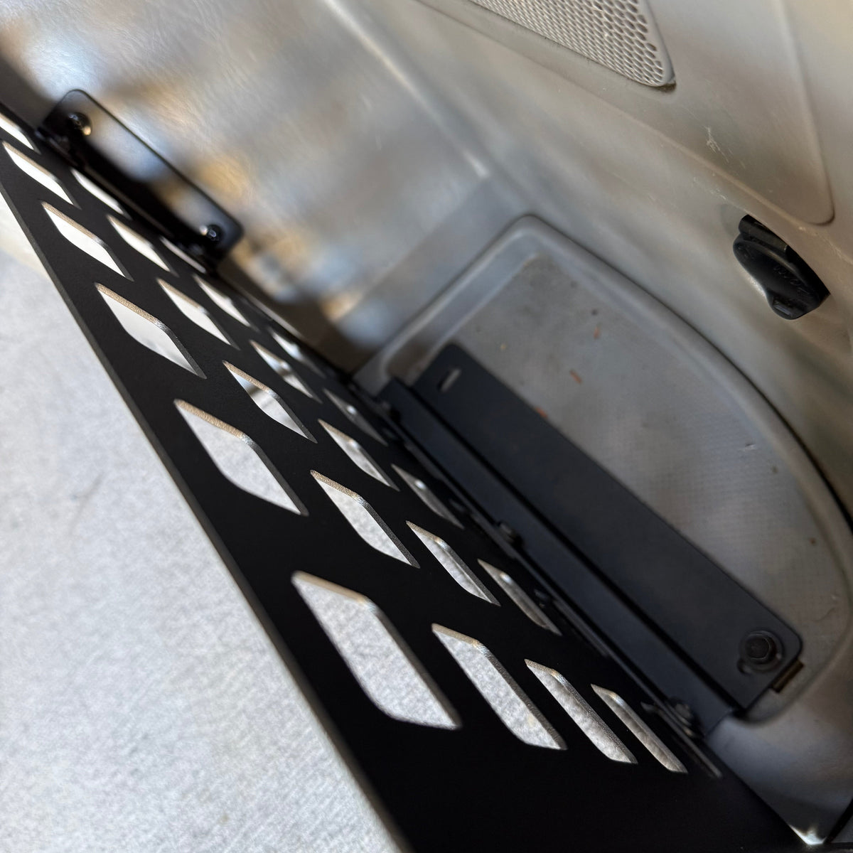 Toyota 4Runner 2003-2009 rear storage pocket Molle panel by Elevate Metalcraft, installed in the vehicle's cargo area.