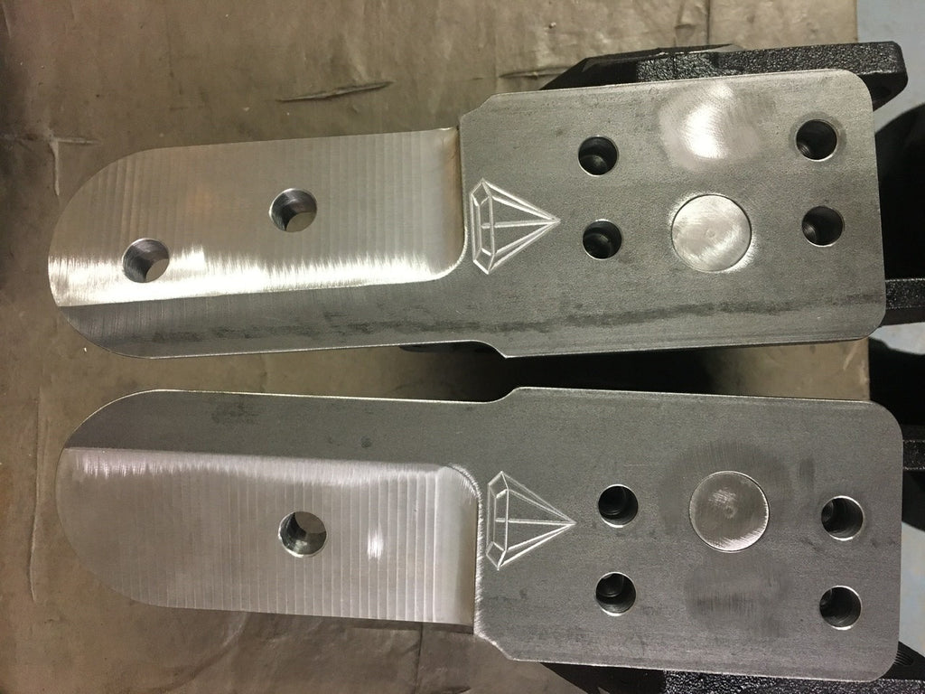 FJ80 High Steer Knuckle Kit with 25mm bearing upsize for Axles Drivetrain by 4XNation, showing the assembled knuckles and components.
