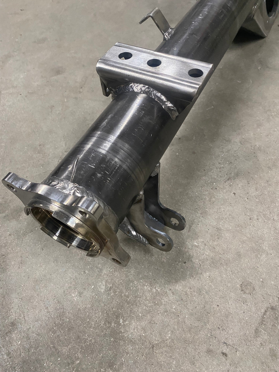 4XNation Tacoma diamond axle housing upgrade for 2005+ models, bolt-in drivetrain component with sturdy construction.