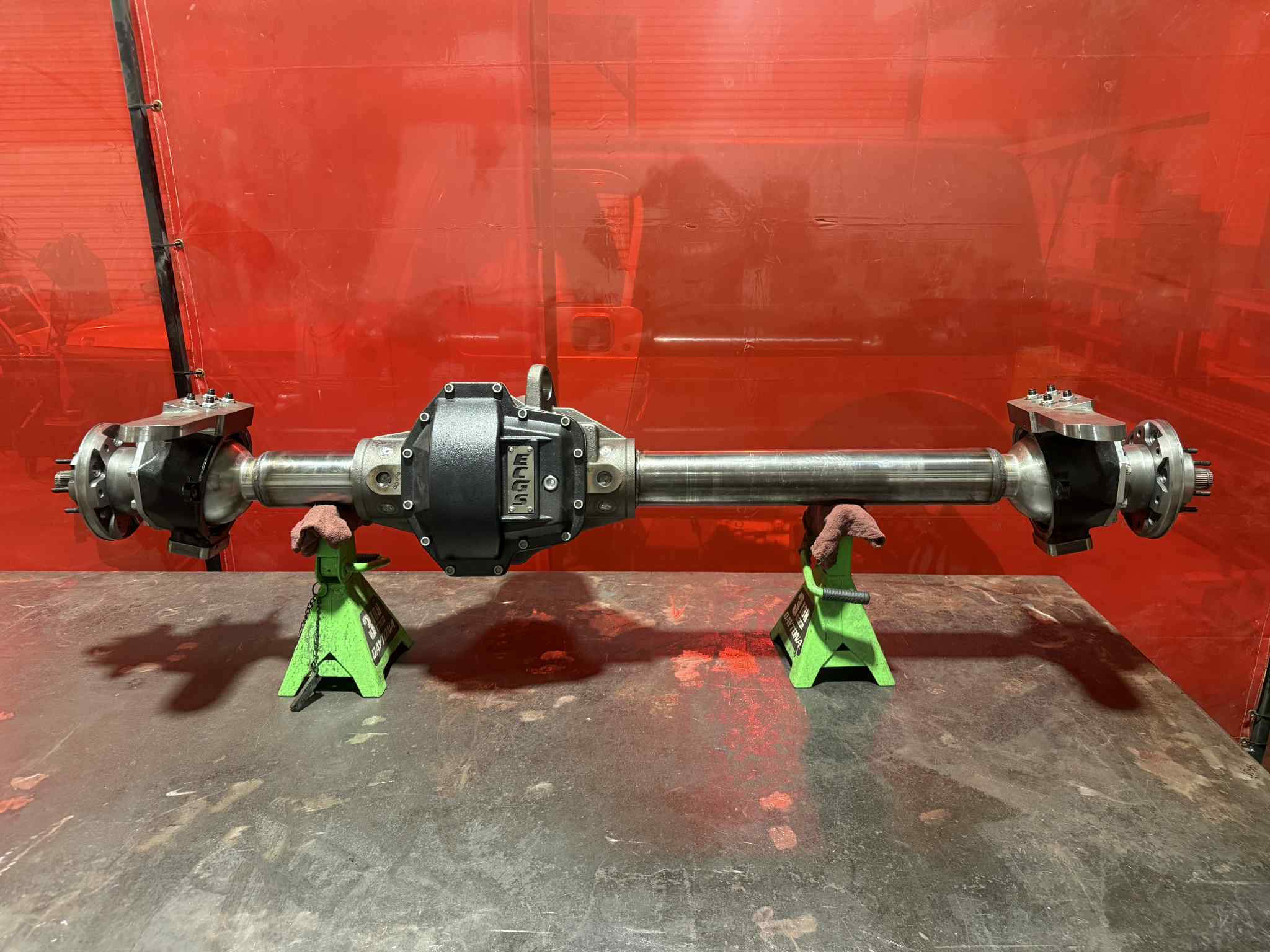 Toyota Front Dana 60 axle housing from 4XNation, showcasing the robust axle and wheel mounting points for off-road drivetrain.