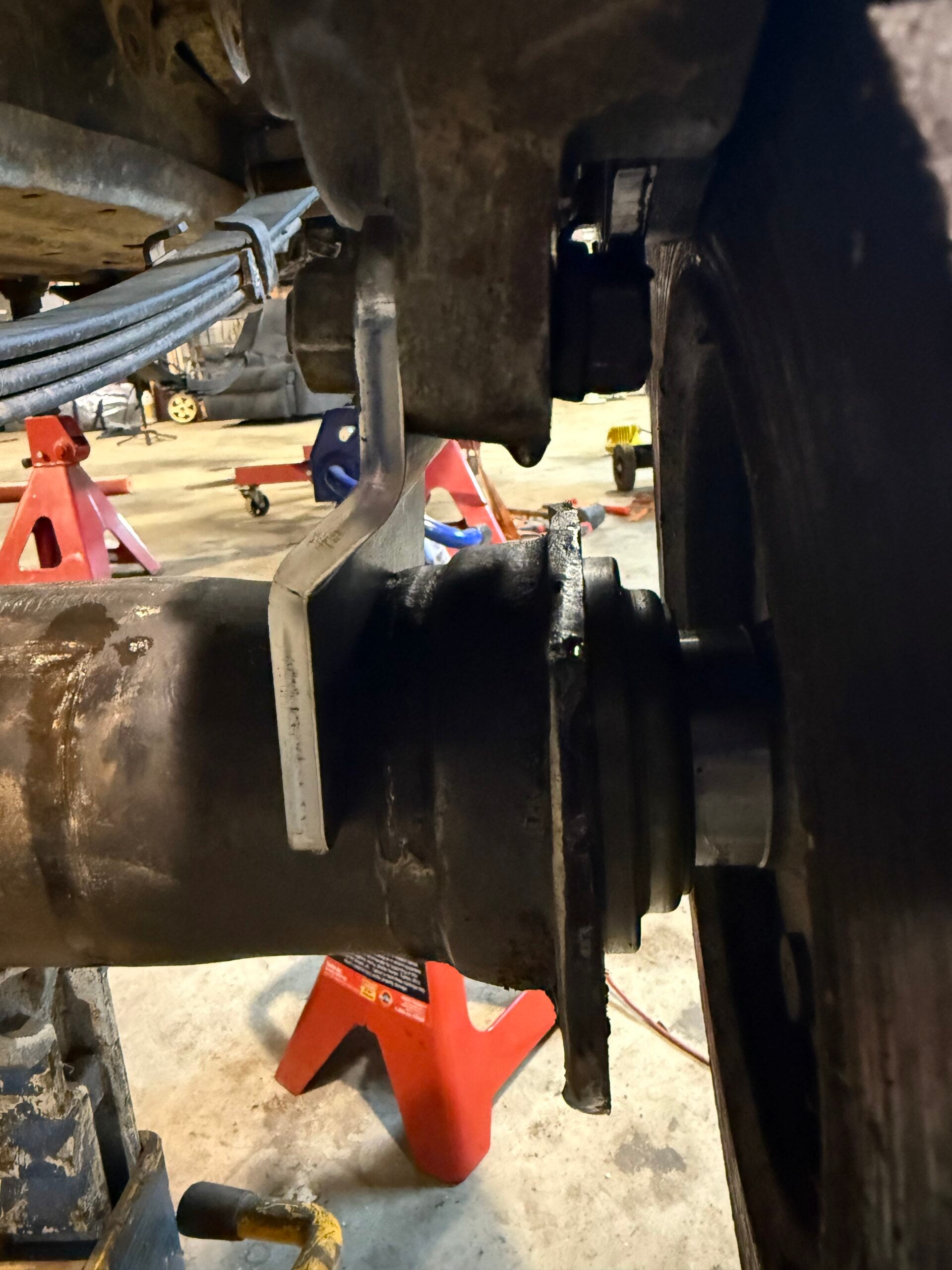 First-generation Toyota caliper bracket by 4XNation for Ford 9-inch housing swap, featuring a 3-1/8 inch flange.