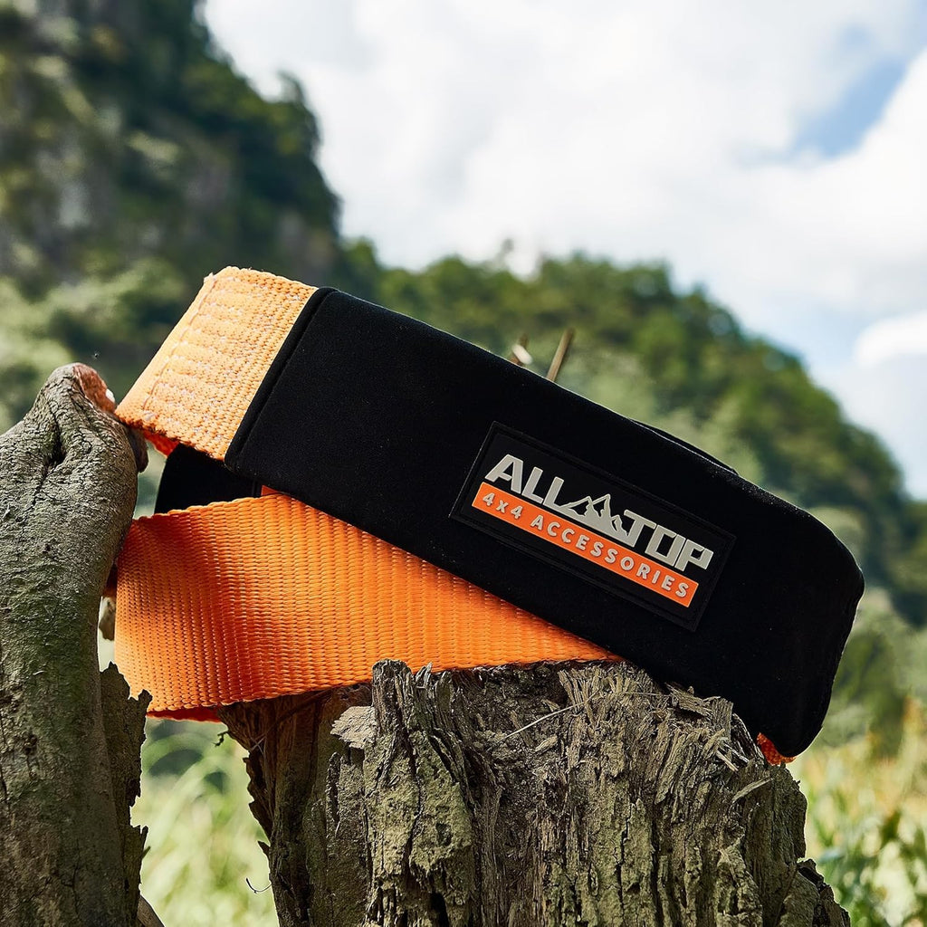 Orange 4XNation Tree Saver Strap, 3-inch x 8-foot recovery tow strap with carry bag, rated for 36,000 lbs break strength.