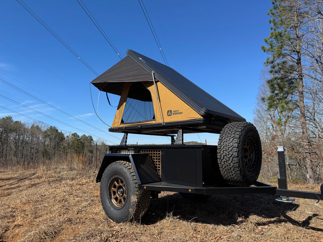 4XNation Weld Together DIY Off Road Overland Trailer Kit shown, including frame, wheels, and components for off-road adventure.