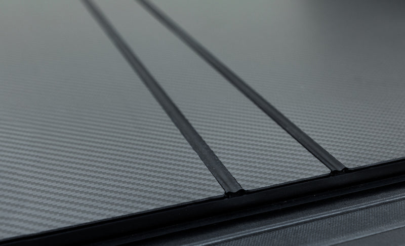 Access LOMAX Tri-Fold Cover 02-18 Dodge RAM 1500 - 6ft 4in Bed (Carbon Fiber) B5040029