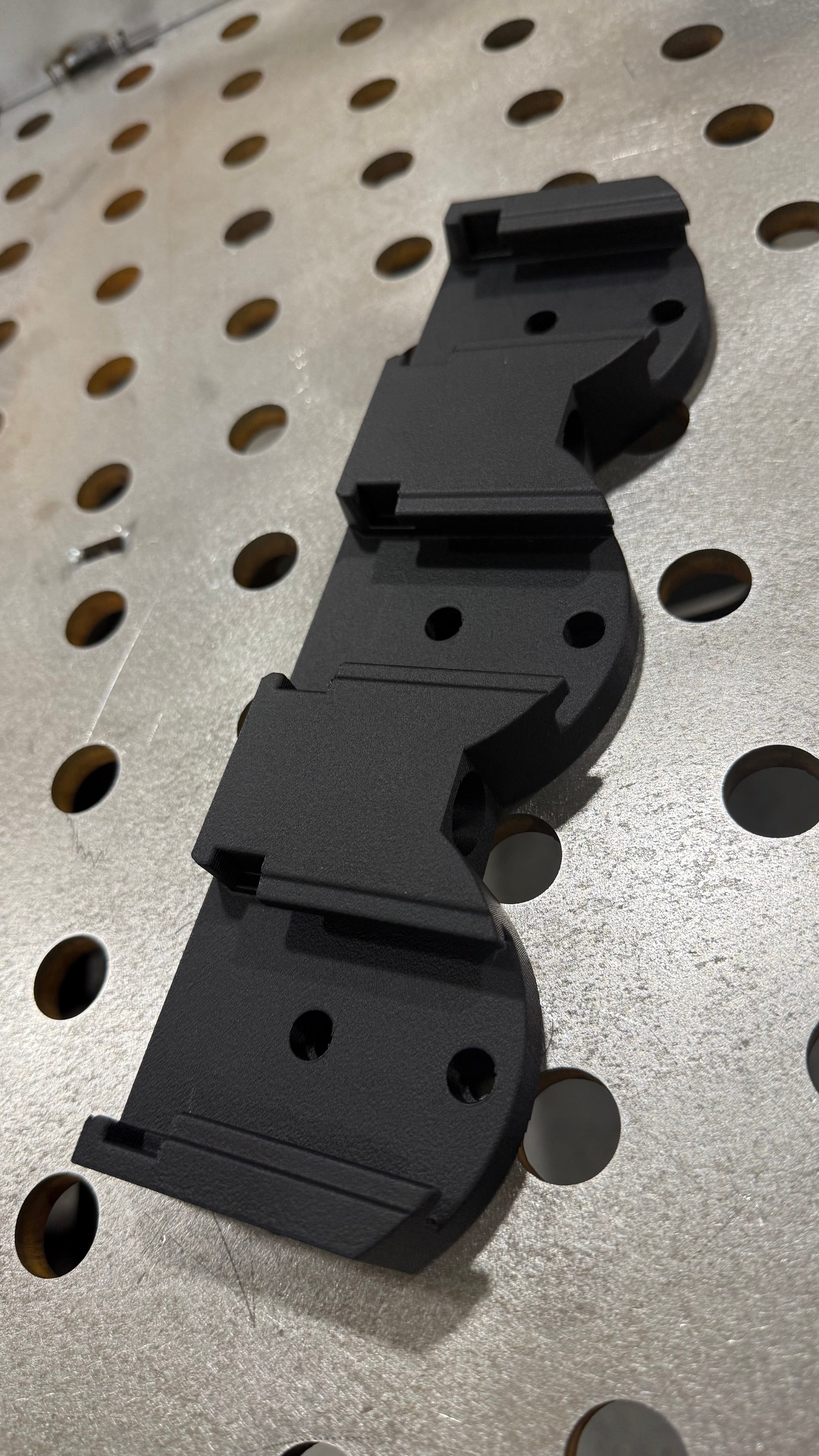 Elevate Metalcraft 3X M18 Locking Battery Mount for secure attachment of M18 batteries to equipment or tools.