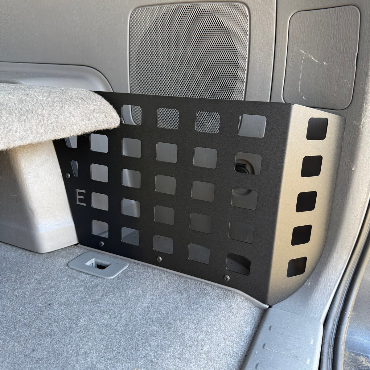 Toyota 4Runner 2003-2009 4th Gen Rear Storage Pocket Molle Panel by Elevate Metalcraft, mounted in vehicle interior.