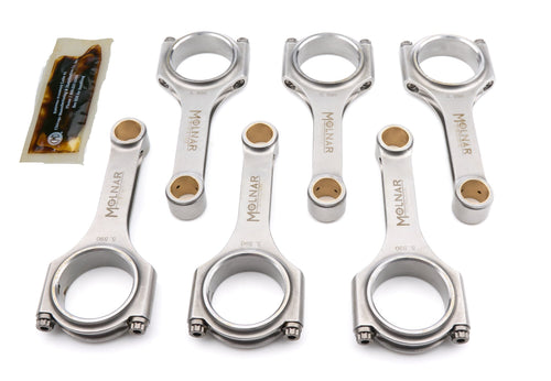 Vinyasa Automotive 5.590 H-beam rod set for Toyota 2JZ-GTE turbo engine, metal engine components with precise machining.