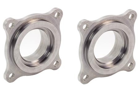 Pair of Toyota semi float flanges for axles, branded Riley Mountain Motorsports, shown in the image with detailed metal construction.