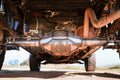 Toyota Tacoma 8.75-inch rear housing axle part by Riley Mountain Motorsports, shown on a black background.