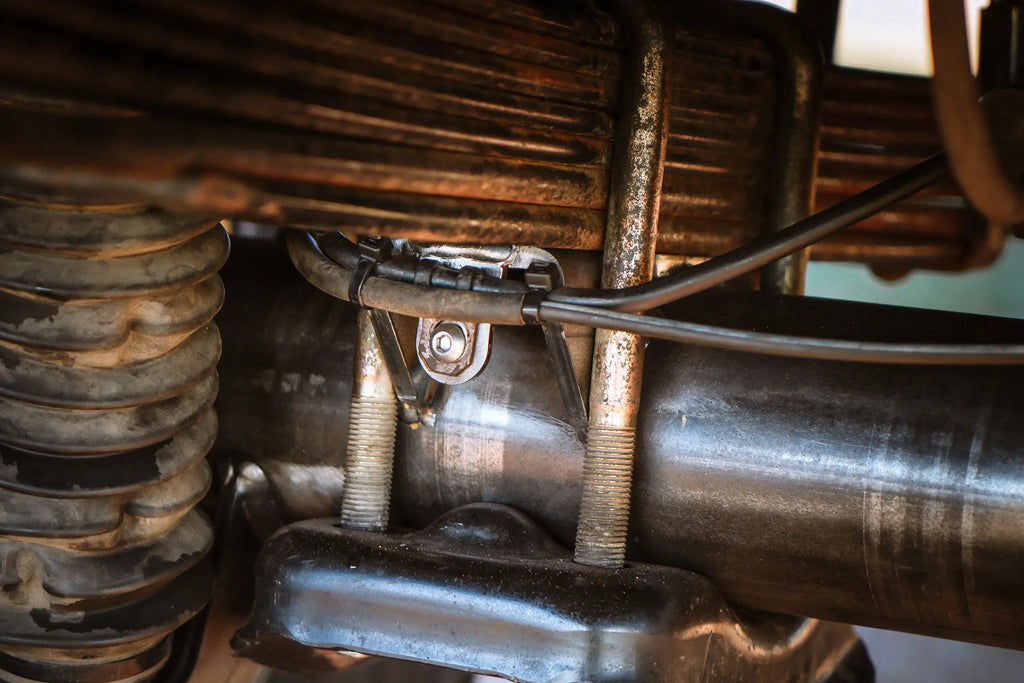 Toyota Tacoma 8.75-inch rear axle housing by Riley Mountain Motorsports, shown in black with mounting points and axle openings.