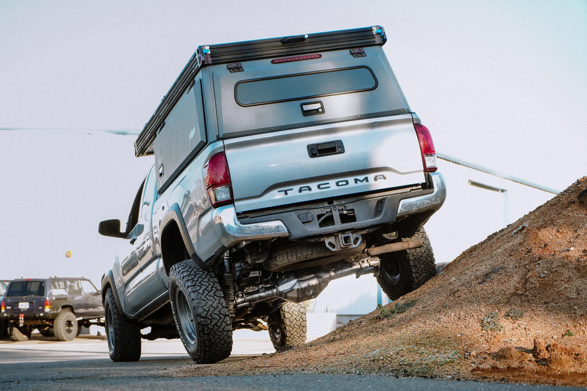 Toyota Tacoma 8.75-inch rear axle housing by Riley Mountain Motorsports, showing the rugged axle structure and mounting points.