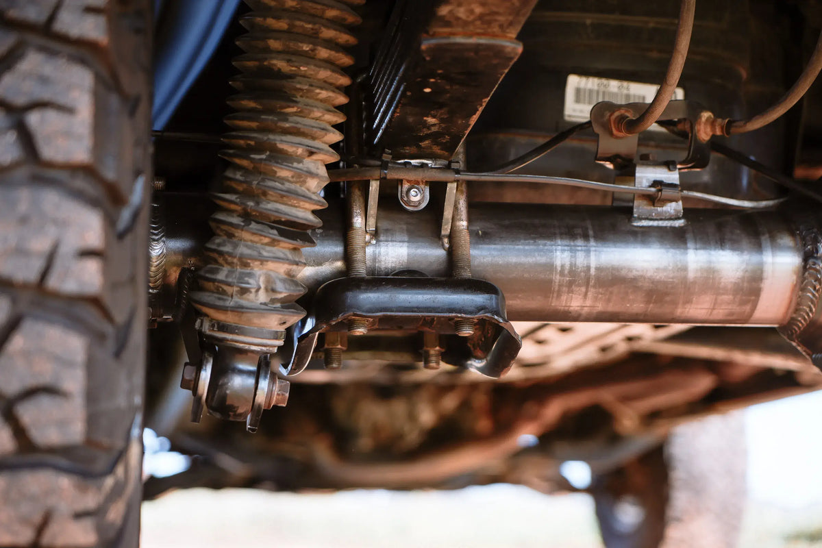 Toyota Tacoma 8.75-inch rear axle housing by Riley Mountain Motorsports, showing the rugged steel construction and mounting points.