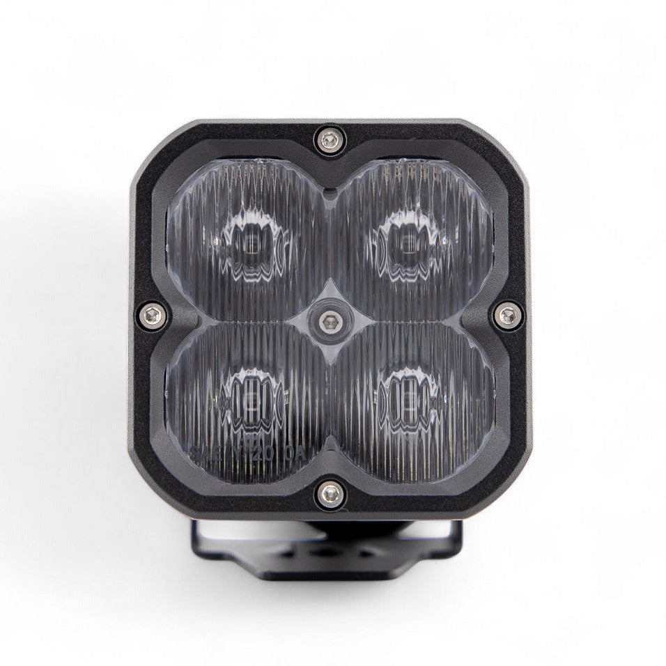 GGLighting RP20 LED Pod with clear lens, showing bright white light emission and compact design for vehicle lighting use.
