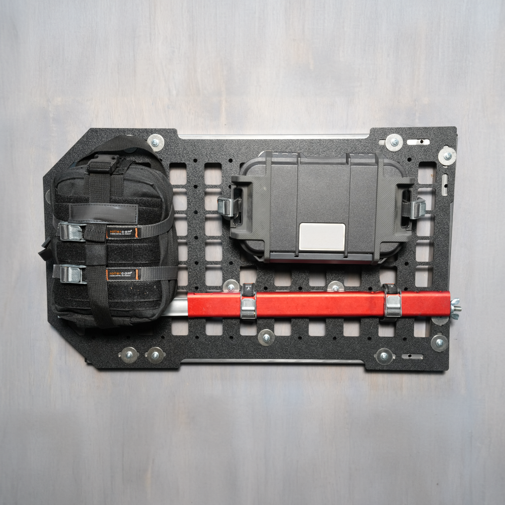 Rollercam MOLLE kit with durable tie-down straps and panel for secure gear attachment and versatile cargo management.