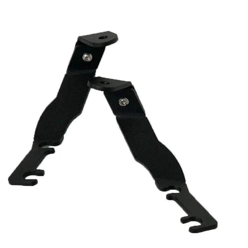 Toyota Tacoma 1995-2004 hood ditch light mounts by Apoc Industries, sturdy metal brackets for off-road ditch lights.