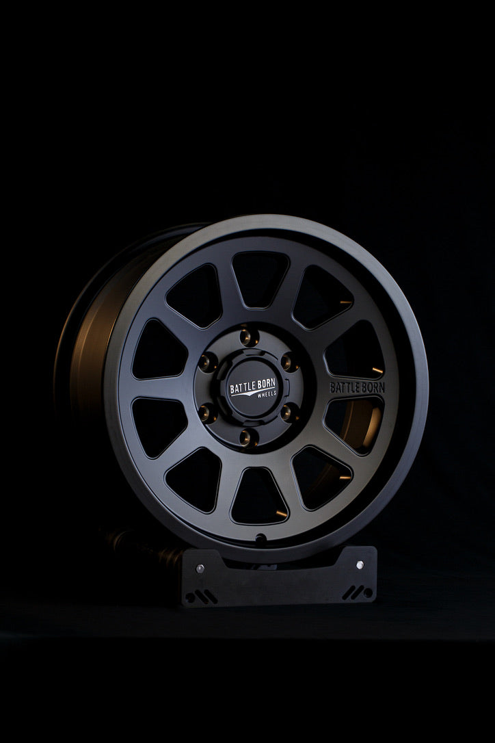 Battle Born Wheels Sierra HoldFAST black blackout wheels, 17x8 inch with 5x5 bolt pattern and 4.75-inch offset, for off-road vehicles.