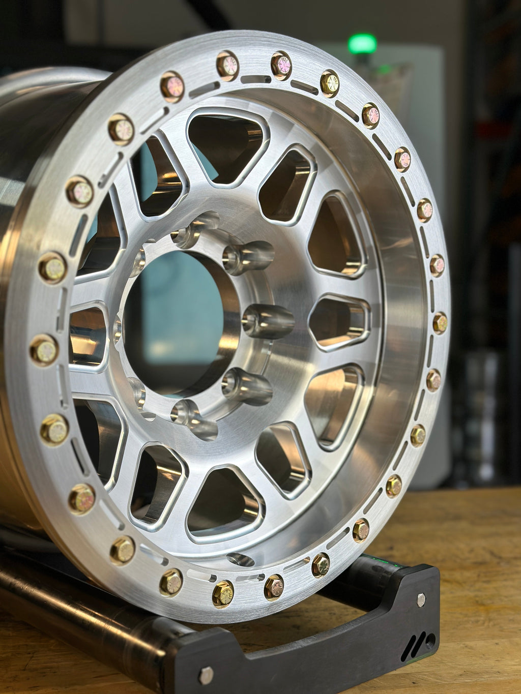 Battle Born Wheels KILO forged 17x9 inch simulated ring wheels with drain holes for Jeep JK, JL, JT models.