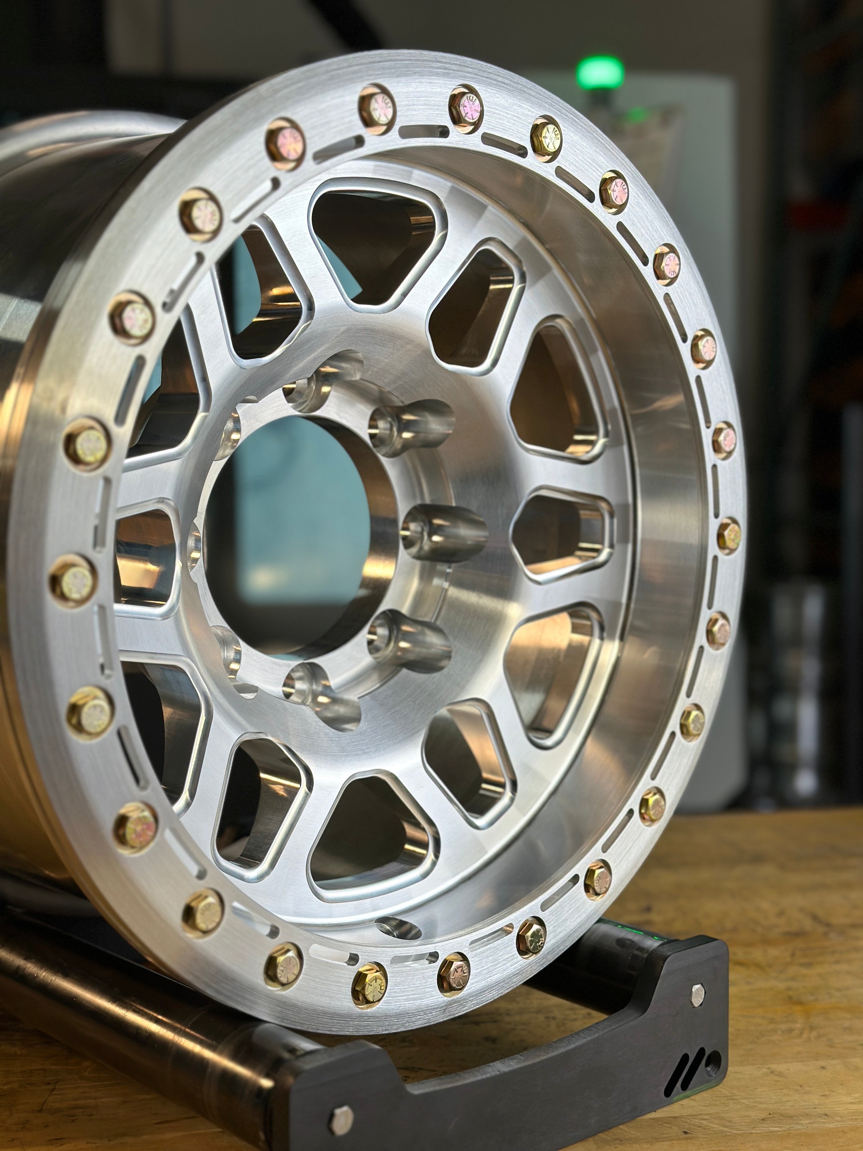 Battle Born Wheels KILO forged 17x9 inch simulated ring wheels with drain holes for Jeep JK, JL, JT models.