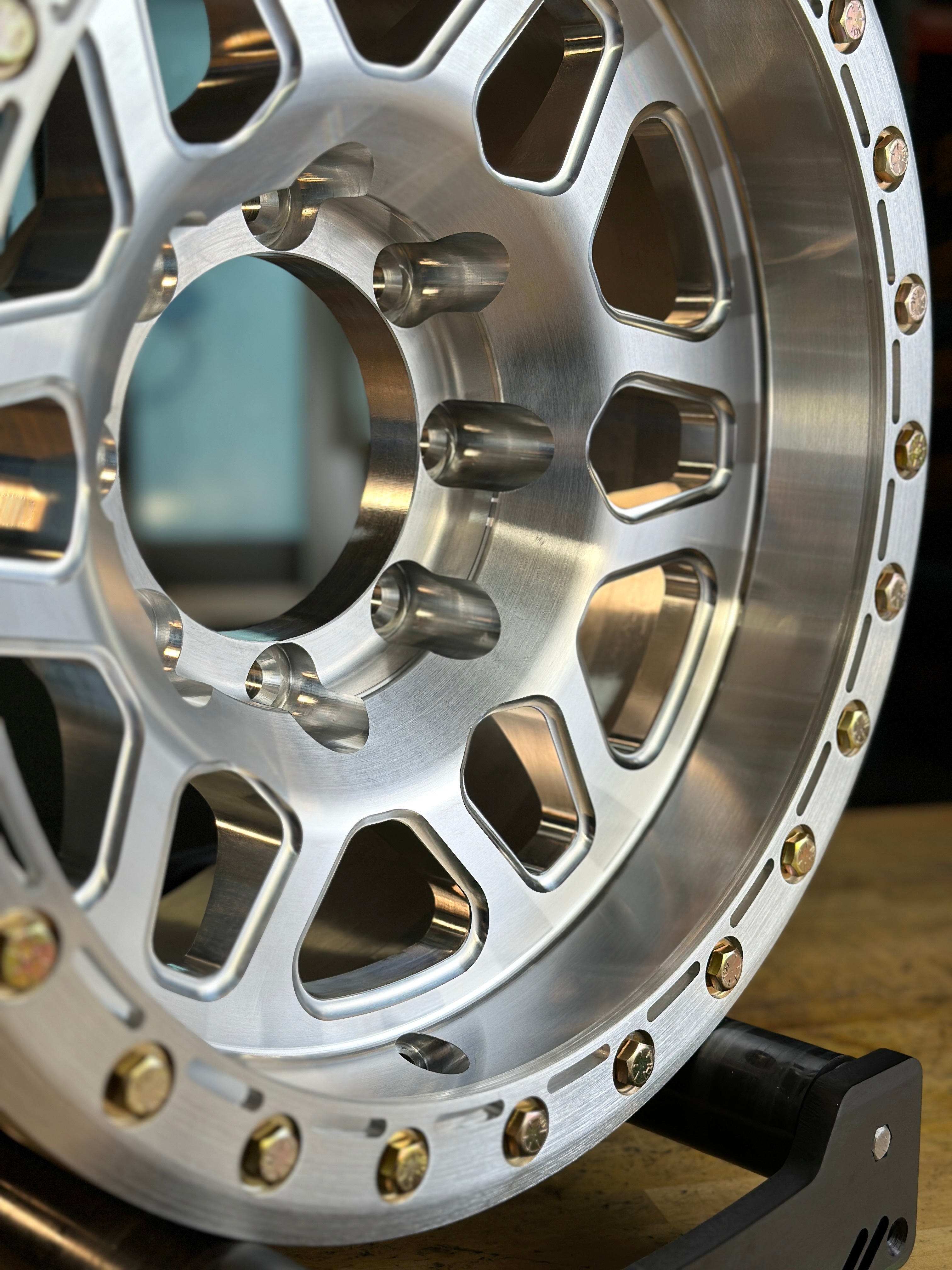 Battle Born Wheels KILO forged simulated wheels, 17x9 inches with 5x5 bolt pattern, machined finish and drain holes for Jeep JK, JL, JT models.