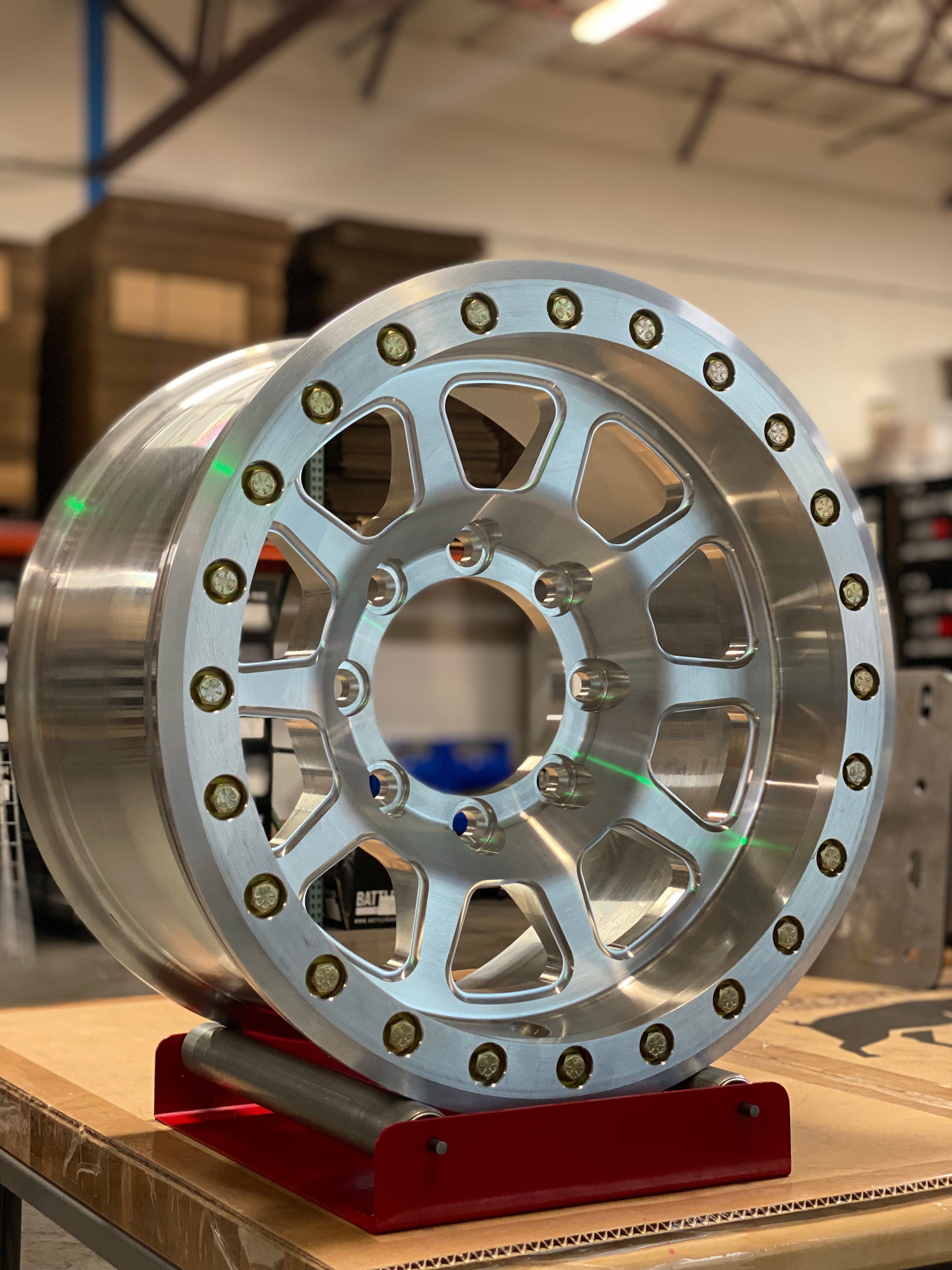 Battle Born Wheels Sierra forged simulated 17x9 Jeep wheel with 5x5.13 bolt pattern, machined finish, drain holes, and ring design.