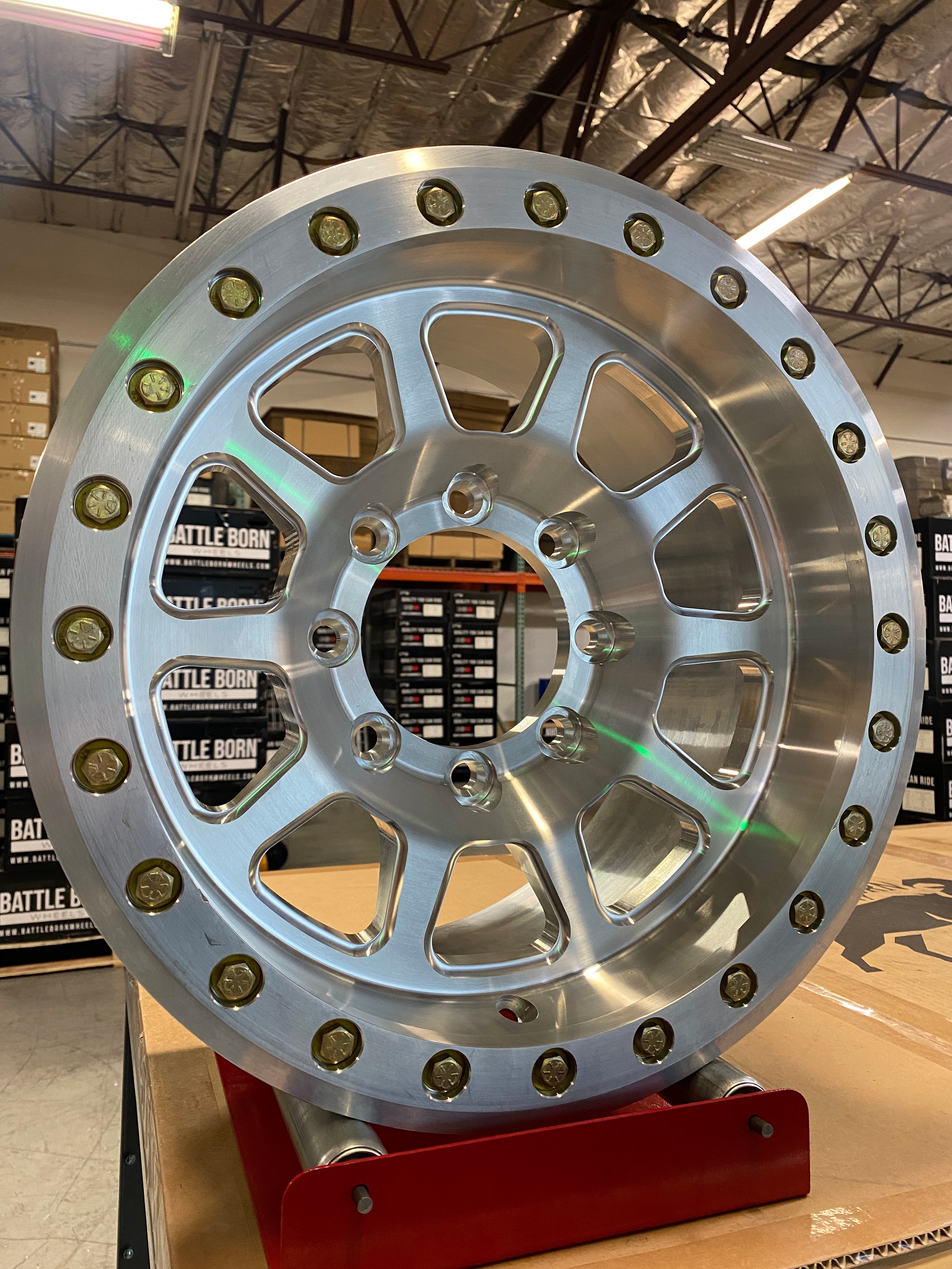 Battle Born Wheels Sierra forged simulated 17x9 Jeep wheels with machined finish, 5x5 bolt pattern, drain holes, and ring details.