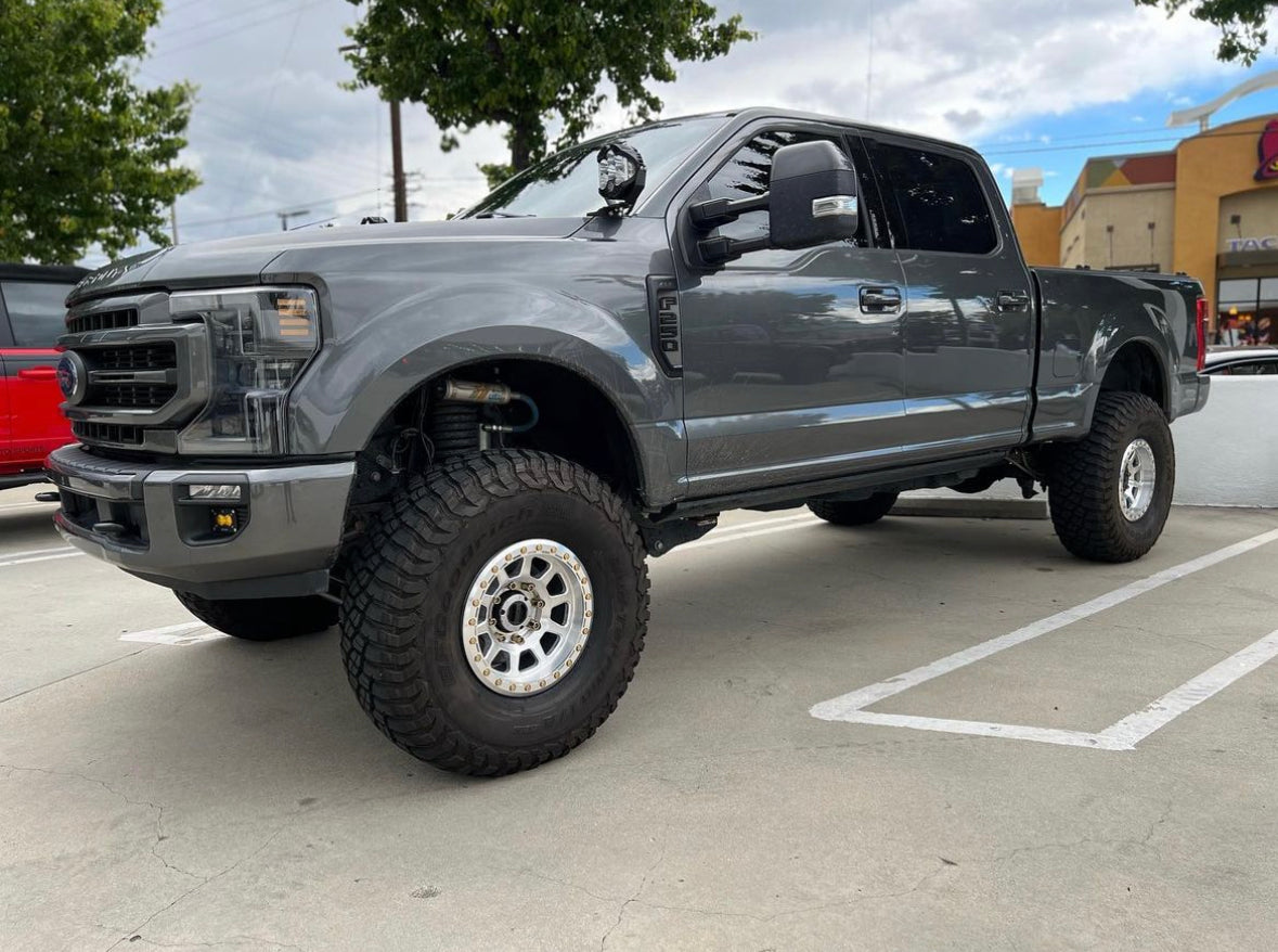 Battle Born Wheels Sierra forged simulated wheel in 17x9 inch with 5x5 bolt pattern, machined finish, and simulated drain holes for Jeep.