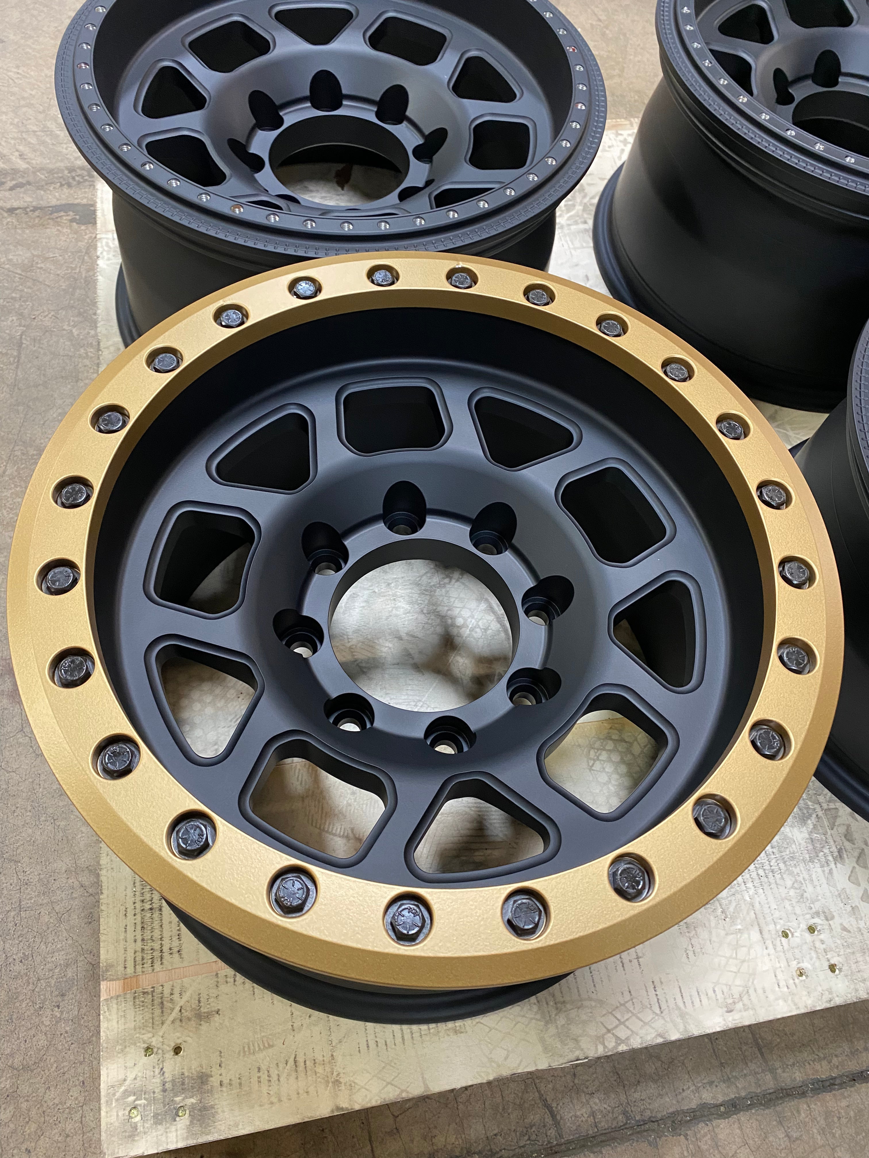 Battle Born Wheels Whiskey forged 17x9 inch simulated ring Jeep wheels with drain holes, designed for Jeep JK, JL, JT models.