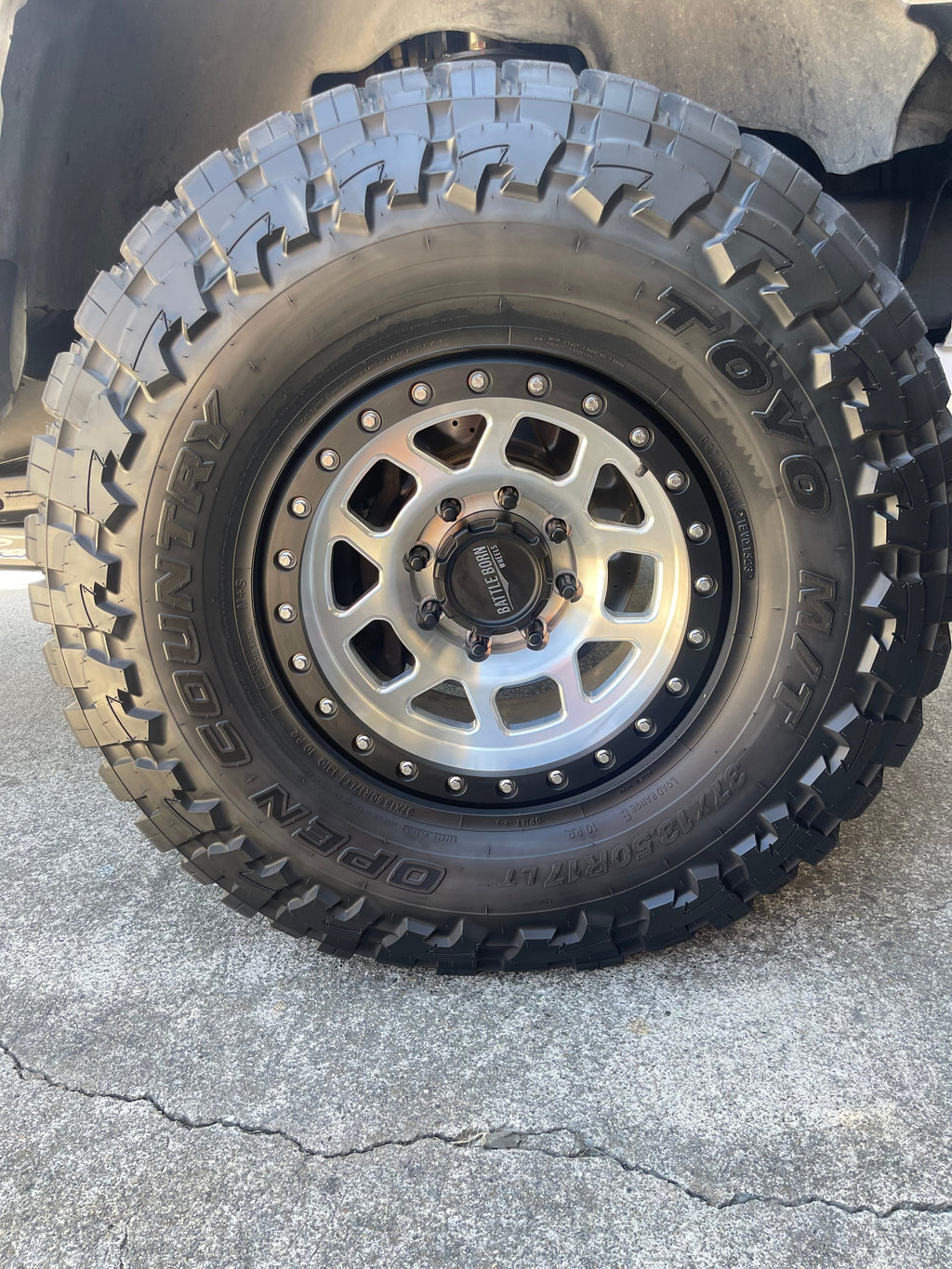 Battle Born Wheels Whiskey Forged simulated wheels, 17x9 inches, with machined finish, drain holes, for Jeep JK, JL, JT models.