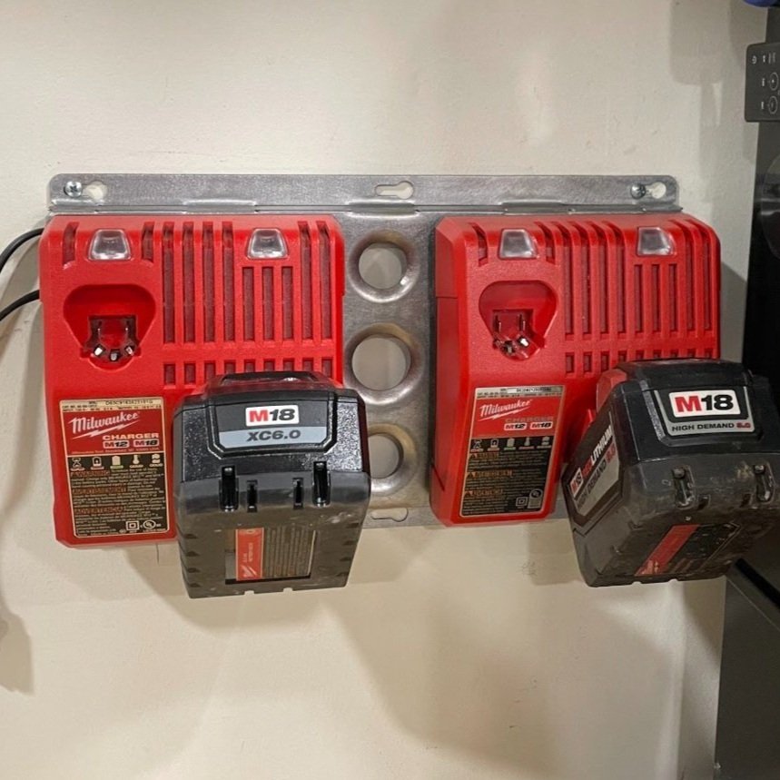 Elevate Metalcraft double charger wall mount plate in rugged design, suitable for Milwaukee and DeWalt tools in van or truck shops.