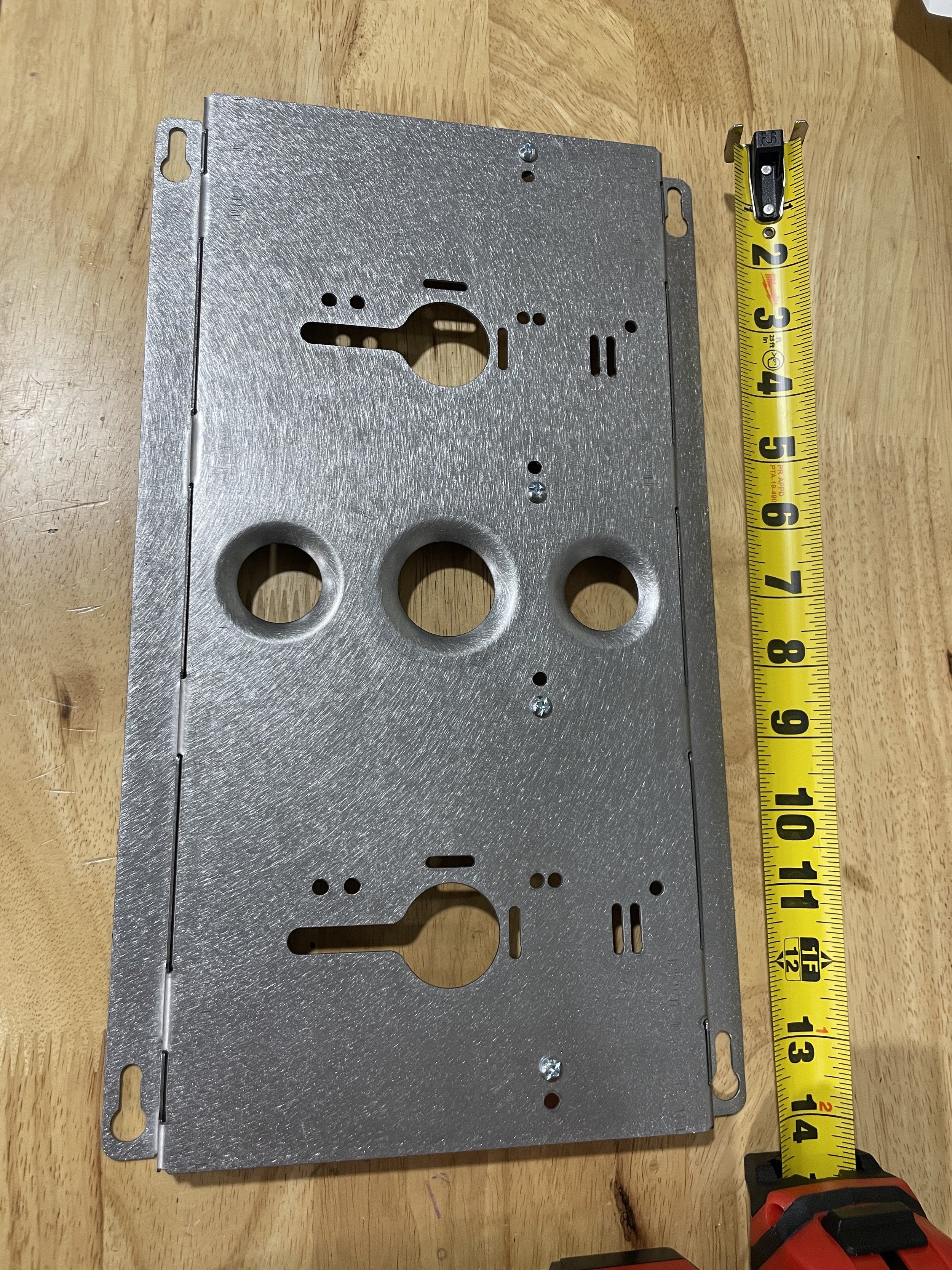 Elevate Metalcraft double charger wall mount plate for Milwaukee and DeWalt tools, designed for van, truck, or shop storage.