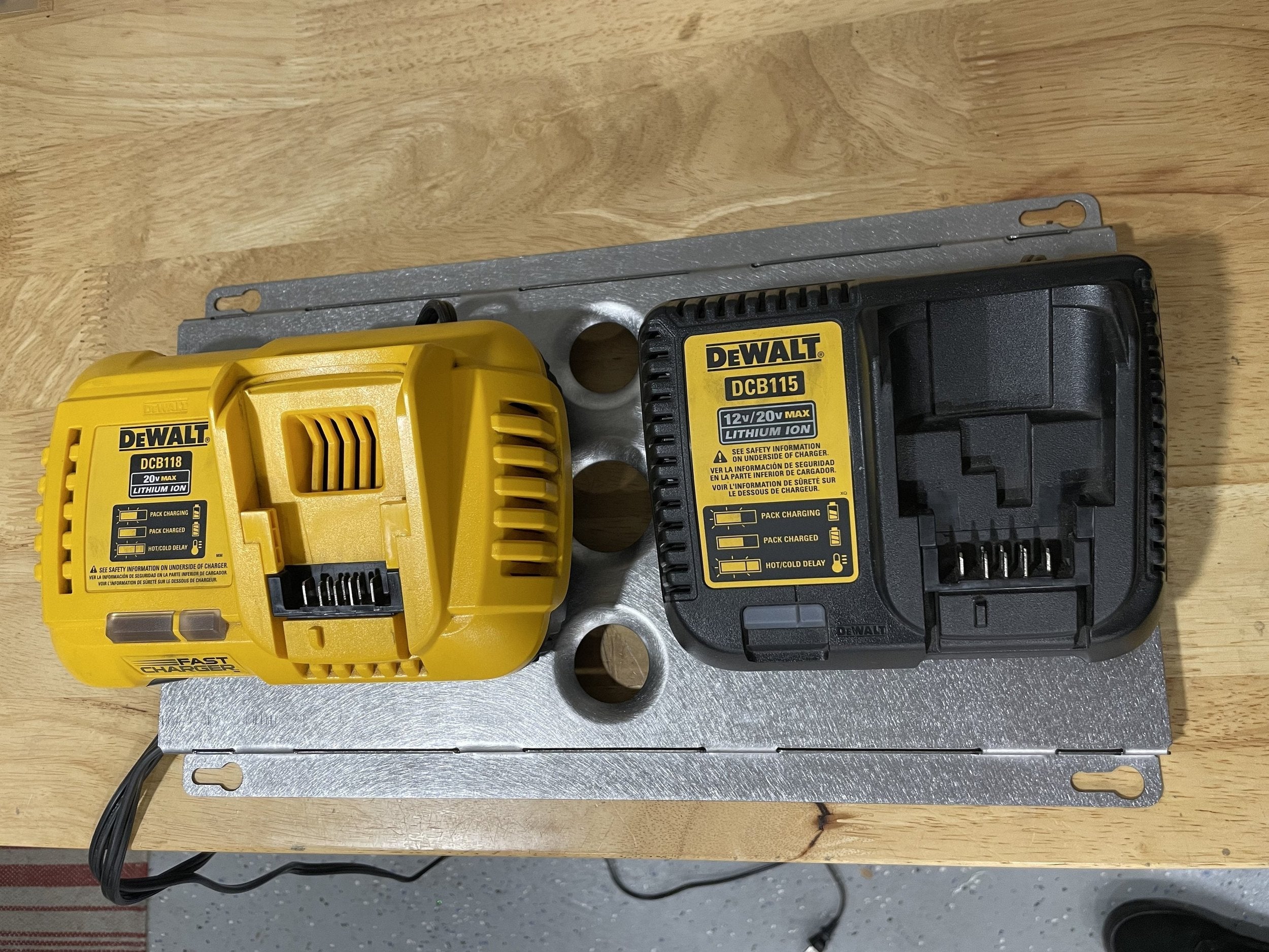 Elevate Metalcraft double charger wall mount plate with Milwaukee and DeWalt logos, designed for van, truck, or shop use.
