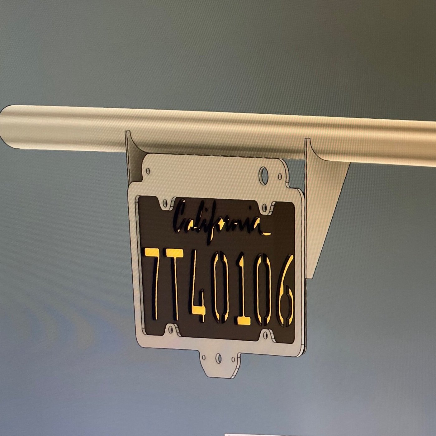 Elevate Metalcraft license plate relocation frame with 3rd brake light weld-on for tubing 1.5 and 1.75 inches on a vehicle.