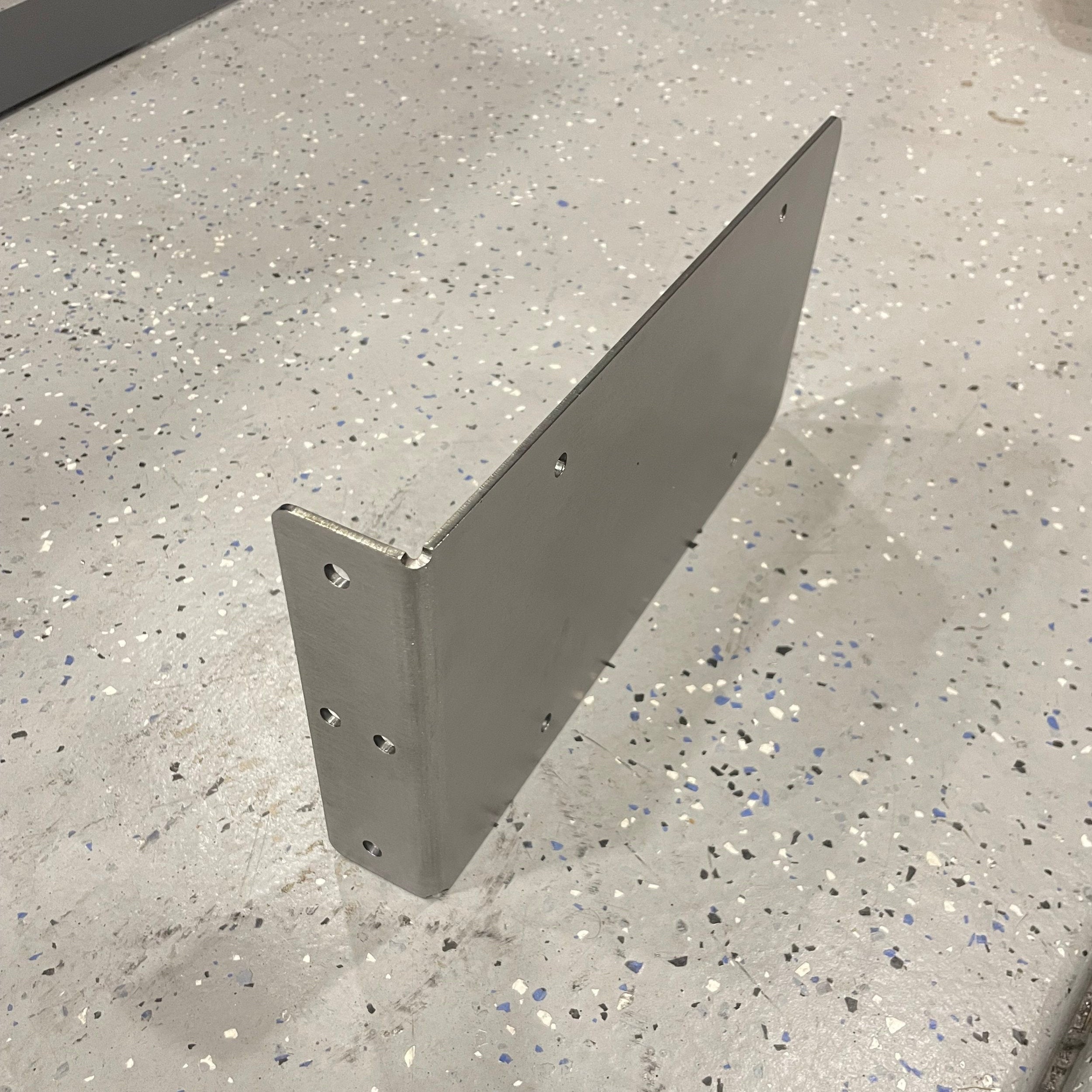 Heavy-duty steel side mount license plate holder for trailers, flatbeds, and RVs by Elevate Metalcraft.