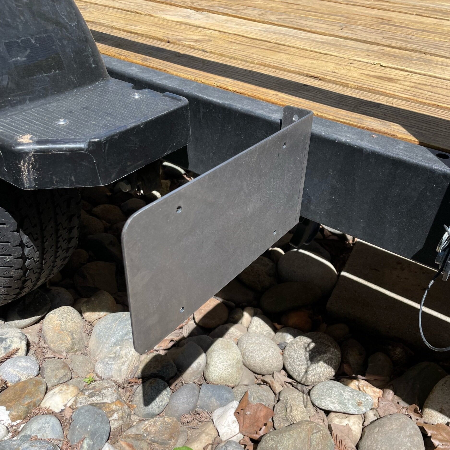 Heavy-duty steel side mount license plate holder for trailers, flatbeds, and RVs by Elevate Metalcraft.