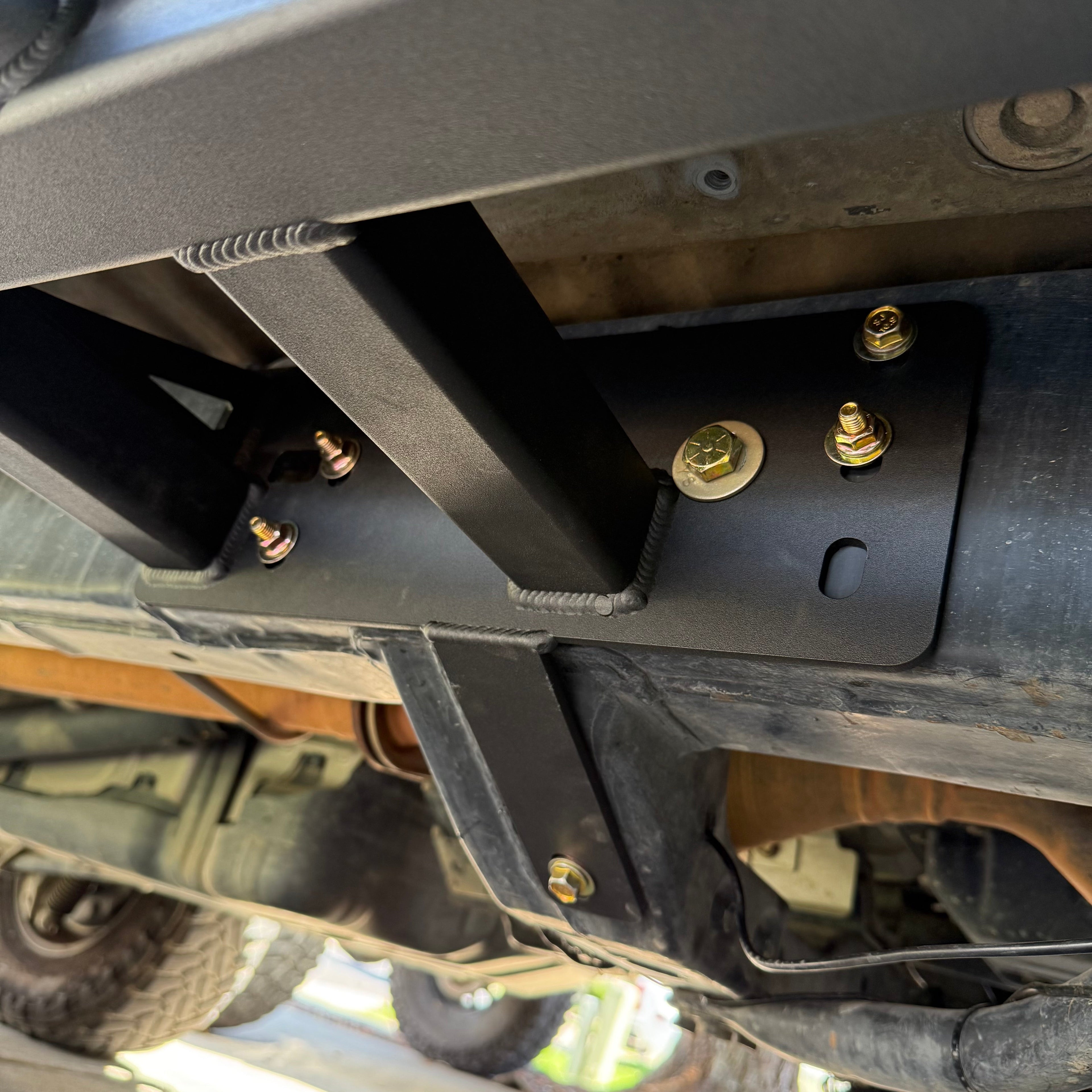 Toyota 4Runner 2003-2009 rock slider bolt-on frame mount plate sets by Elevate Metalcraft, showing the sturdy metal mounting plates.
