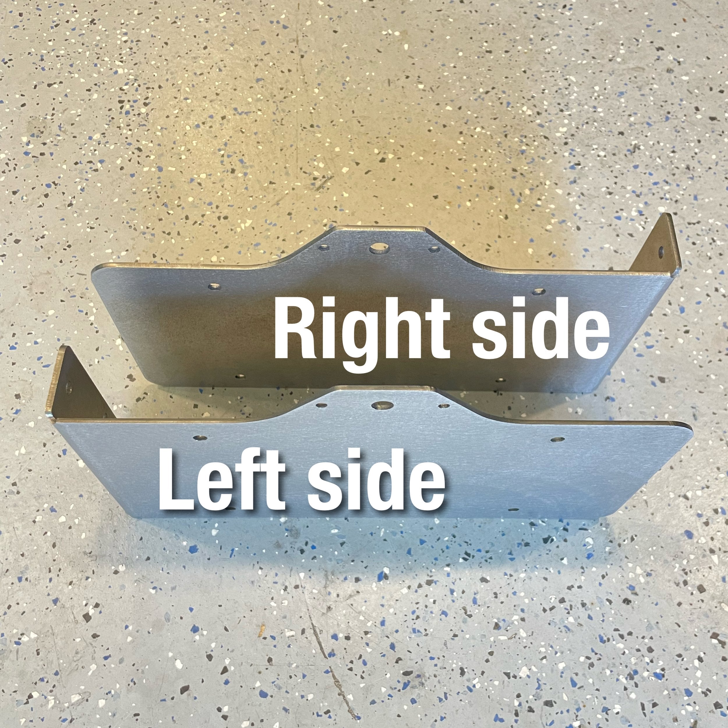 Heavy-duty steel side mount license plate holder for trailers, RVs, and semi-trailers with LED light by Elevate Metalcraft, right side view.