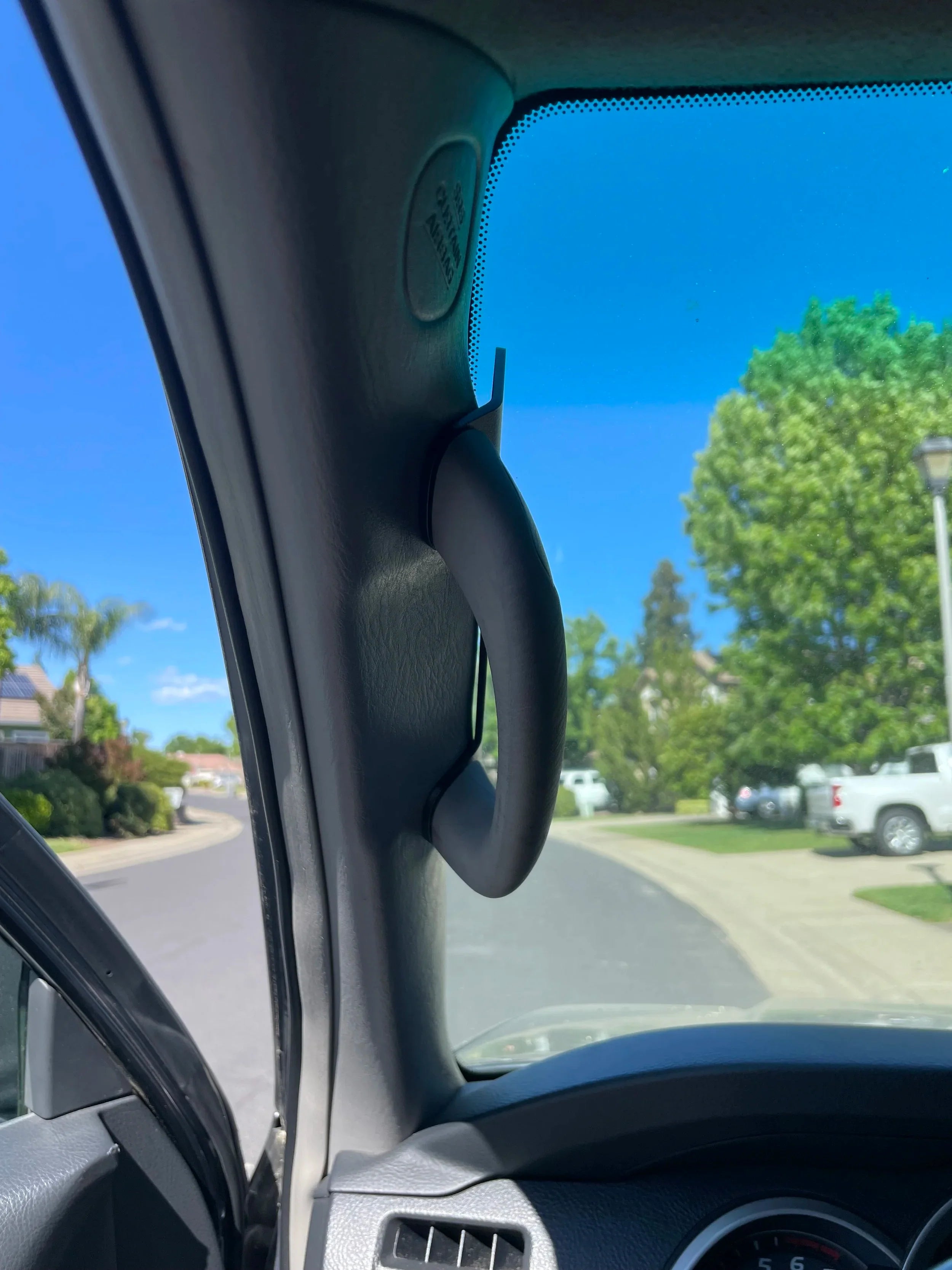 Black Elevate Metalcraft A-Pillar Grab Handle Accessory Mount for Lexus GX470, holds phones, ham radios, switches, and winch controllers.