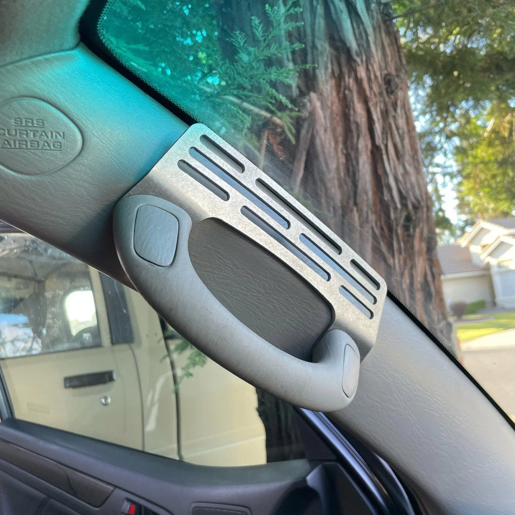 Black Elevate Metalcraft A-Pillar Grab Handle Accessory Mount for Lexus GX470, holds phones, radios, switches, and winch controllers.
