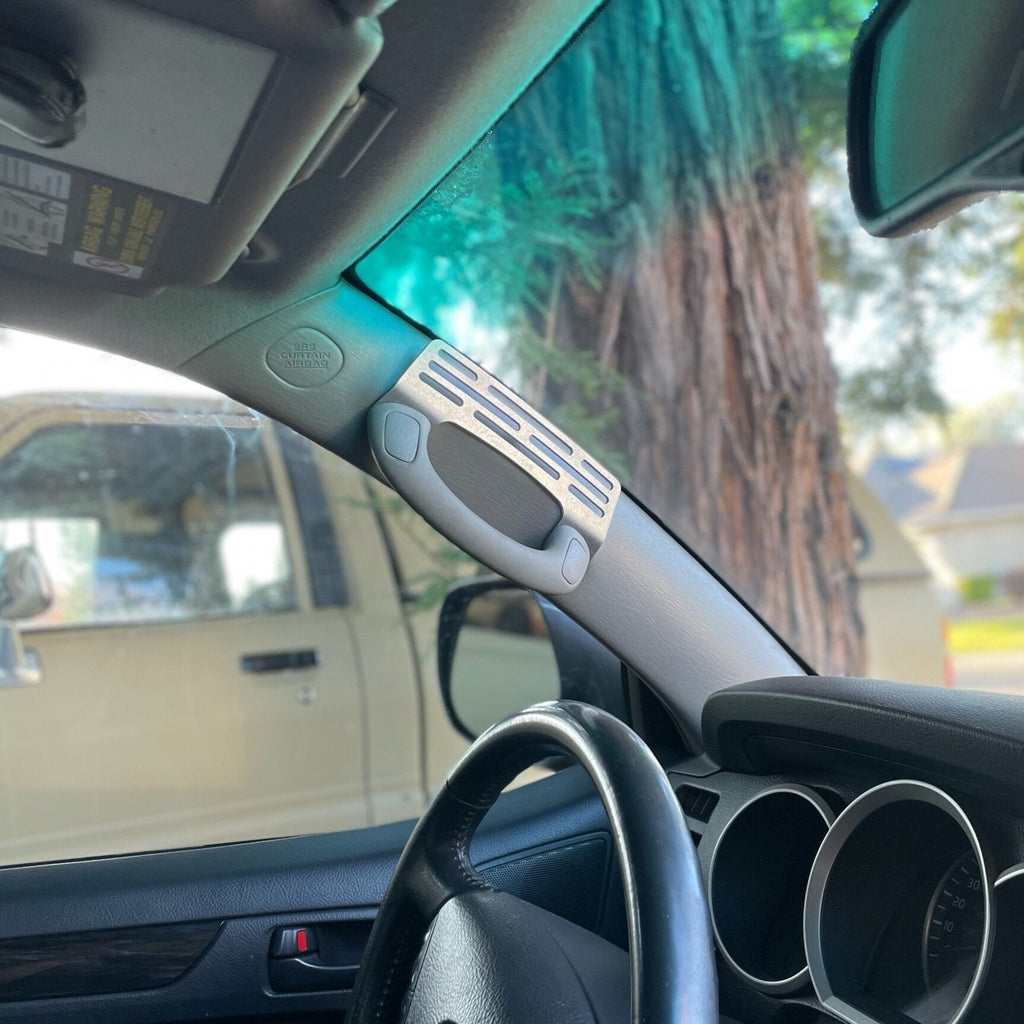 Elevate Metalcraft A-Pillar Grab Handle Accessory Mount in raw tumbled steel for 2003-2009 Toyota 4Runner, holds phones and radios.