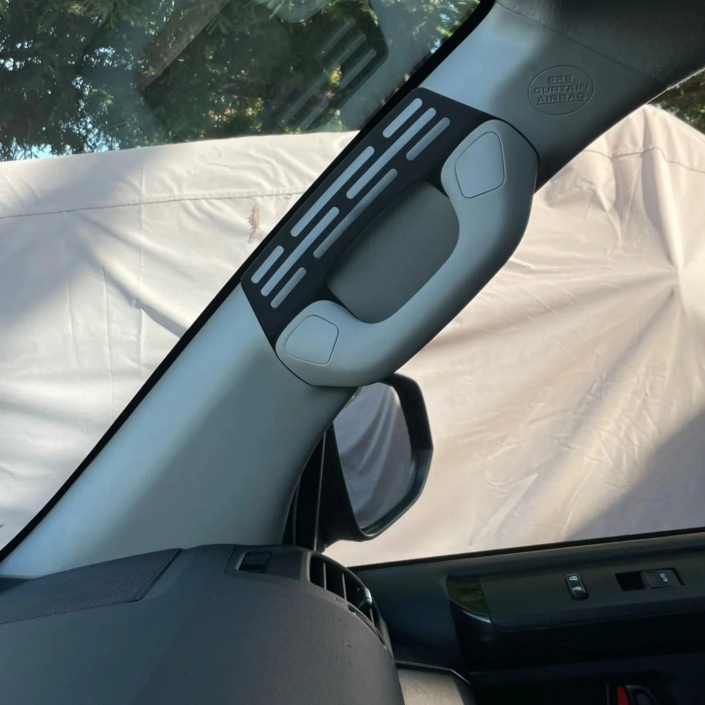 Elevate Metalcraft A-Pillar Grab Handle Accessory Mount in raw tumbled steel for Lexus GX460, holding phones, radios, and switches.