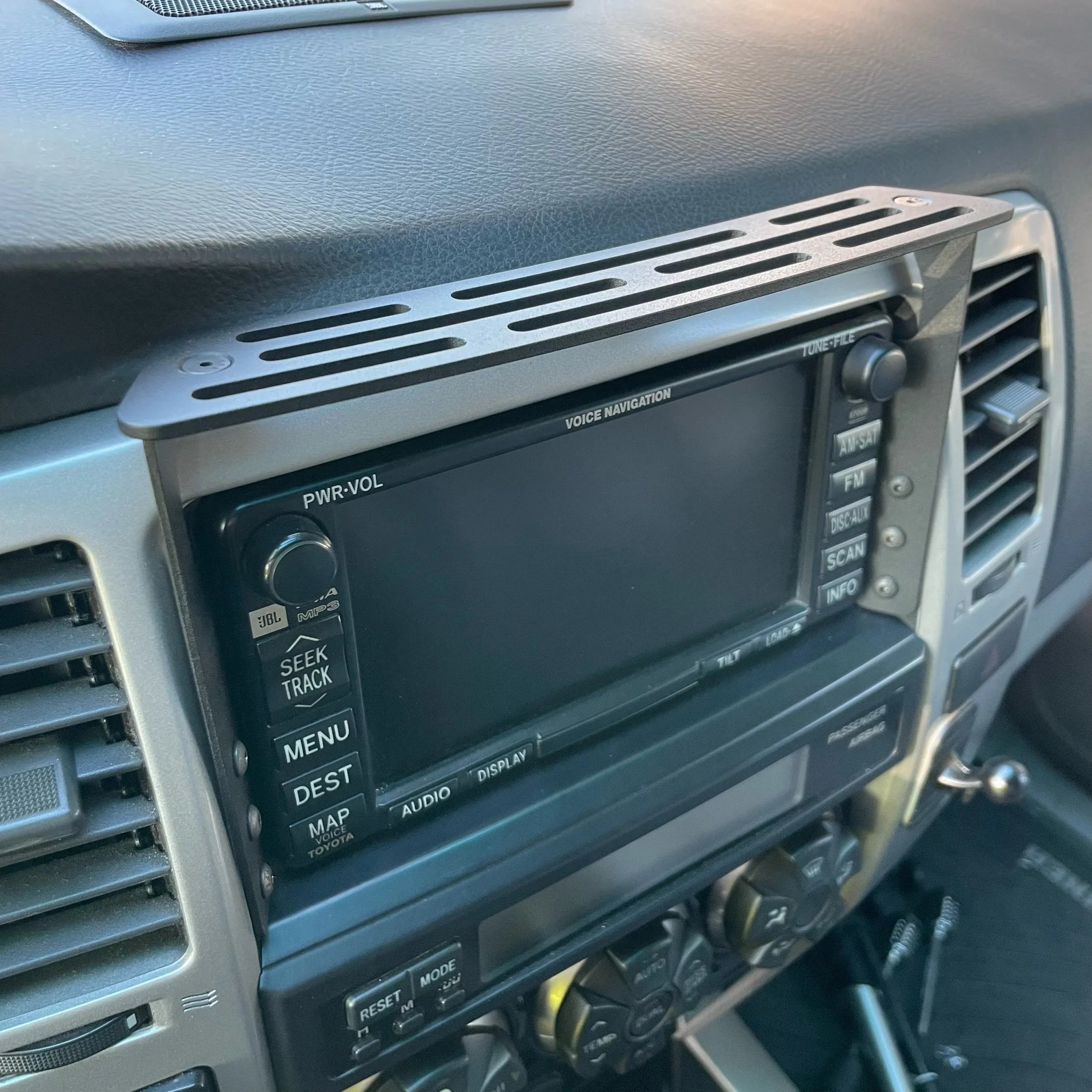 Elevate Metalcraft dash mount for 2003-2009 Toyota 4Runner, raw tumbled steel, slim design for AMP, phone, tablet, and radios.