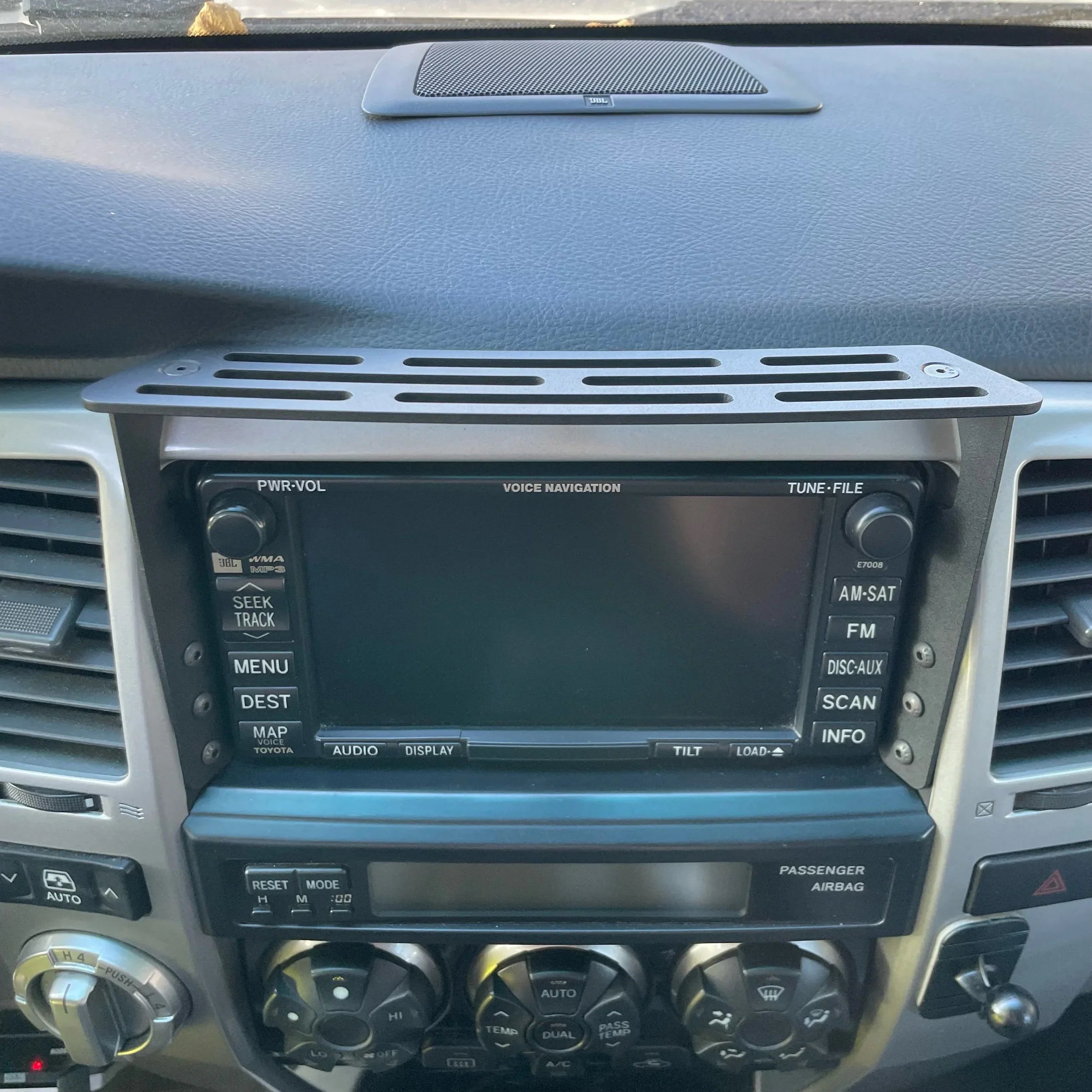 Elevate Metalcraft dash mount for 2003-2009 Toyota 4Runner, raw tumbled steel, slim design with two bolts for phone, tablet, or radio.