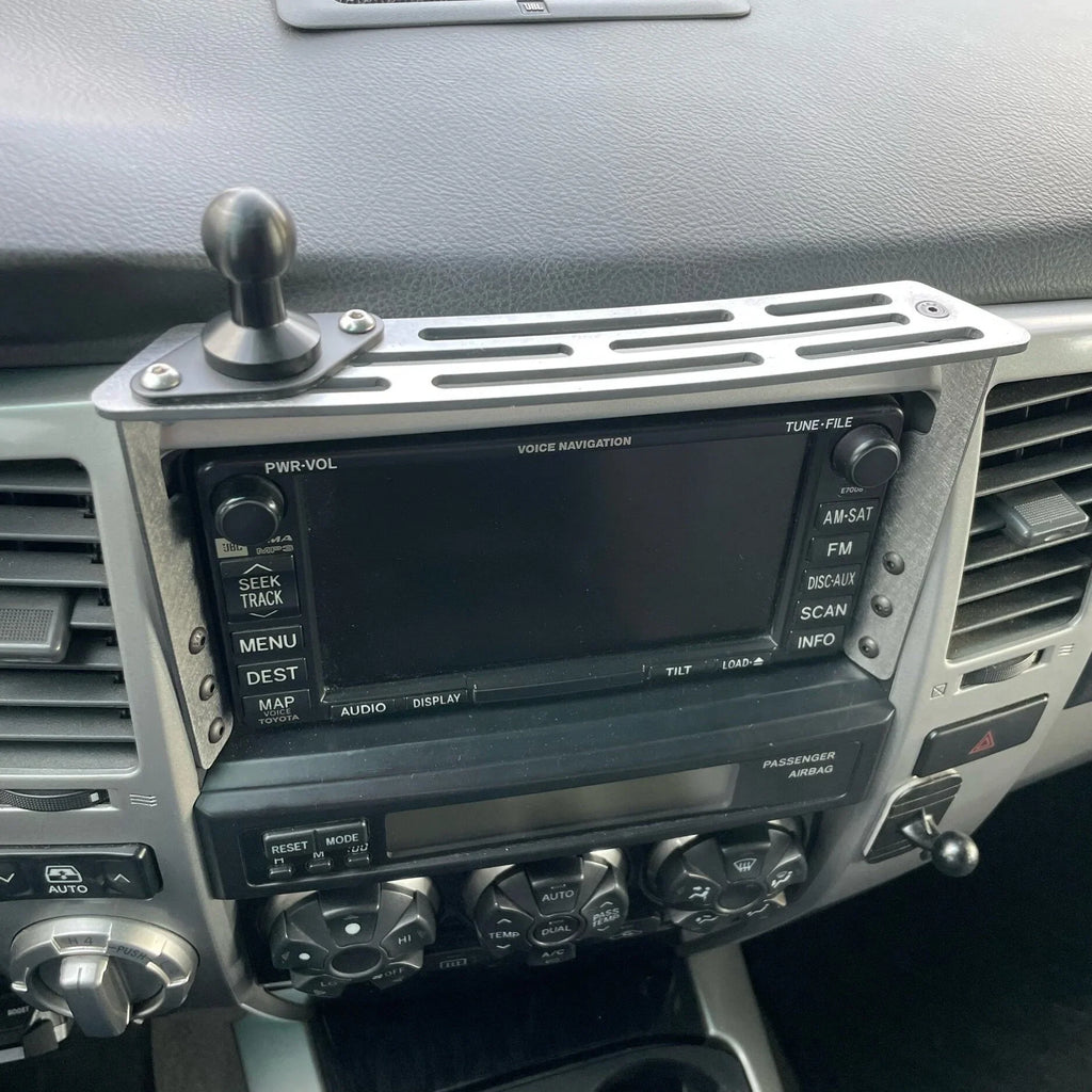 Elevate Metalcraft dash mount for 2003-2009 Toyota 4Runner, made of raw tumbled steel, holds AMP phone, tablet, and radios.