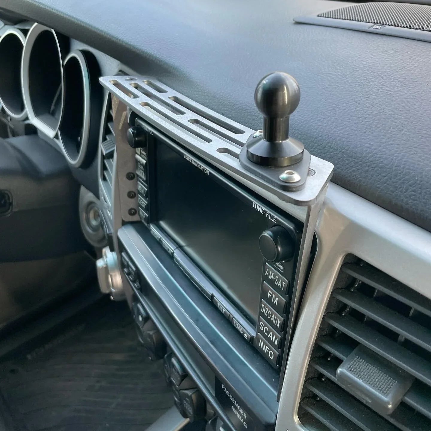 Elevate Metalcraft dash mount for 2003-2009 Toyota 4runner, raw tumbled steel, slim design with two bolts for phone, tablet, and radio overlanding.