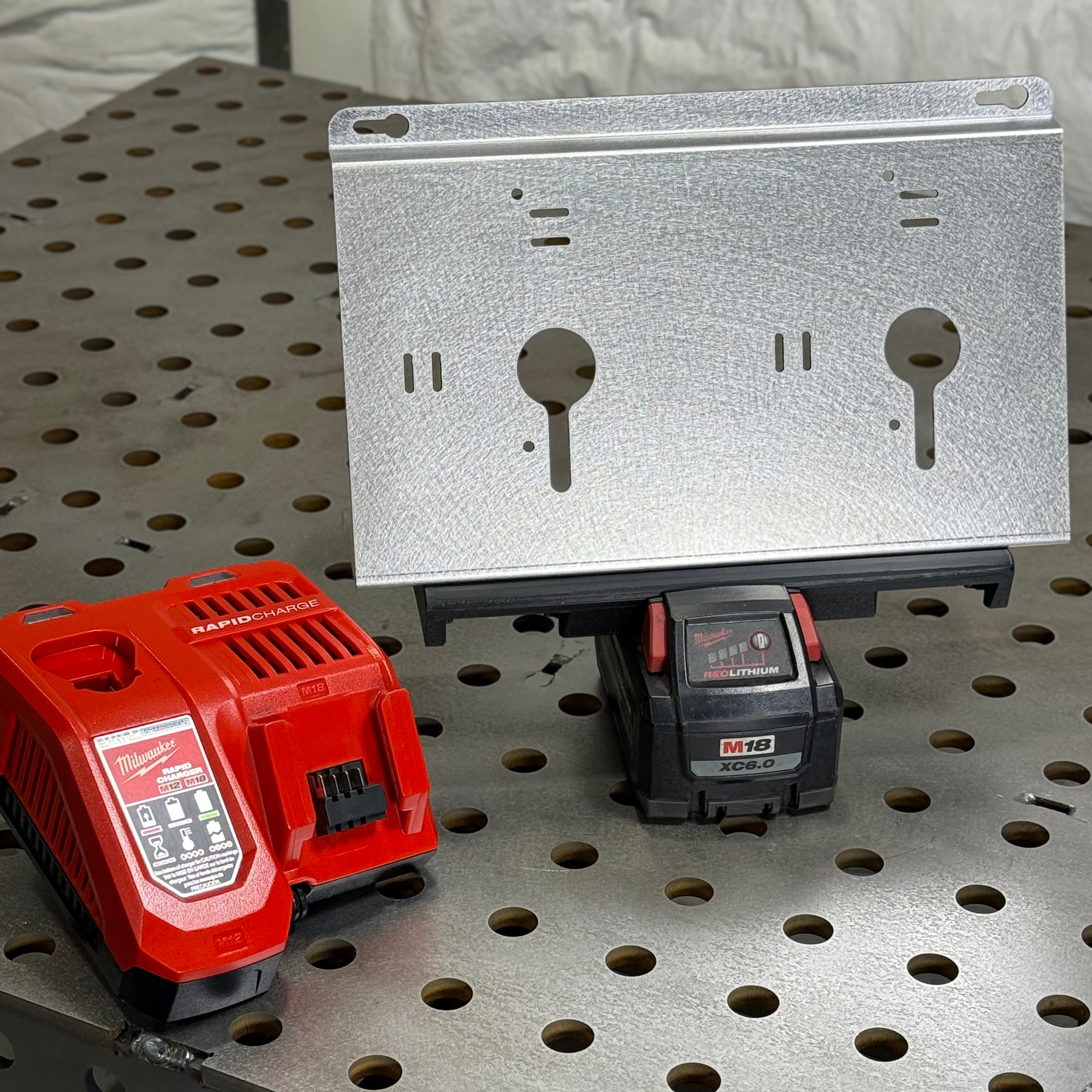 Elevate Metalcraft 3X M18 Locking Battery Mount for secure attachment of M18 batteries in industrial applications