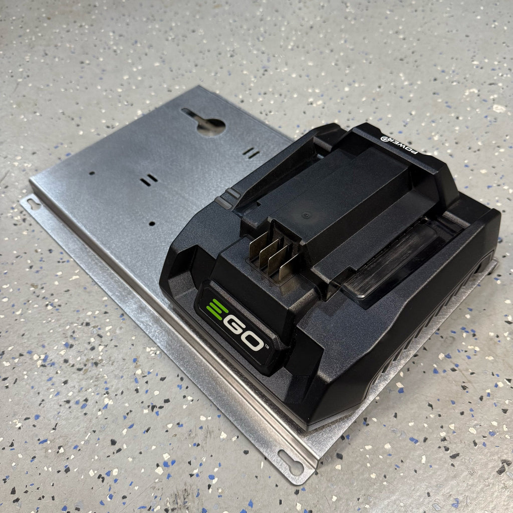 Steel wall mount for EGO 56 Volt double battery charger by Elevate Metalcraft, quick-release design for contractor service trucks and vans.