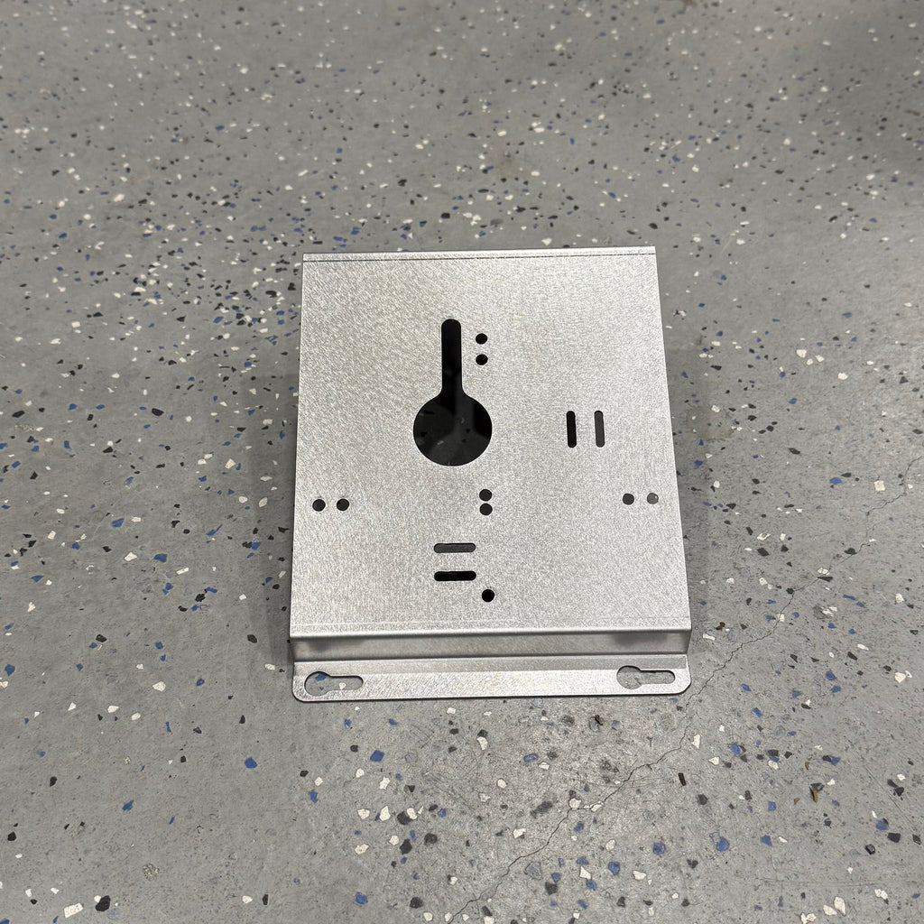 Milwaukee M18 M12 rapid battery charger wall mount plate with 20-degree angle for van, truck, or workshop by Elevate Metalcraft.